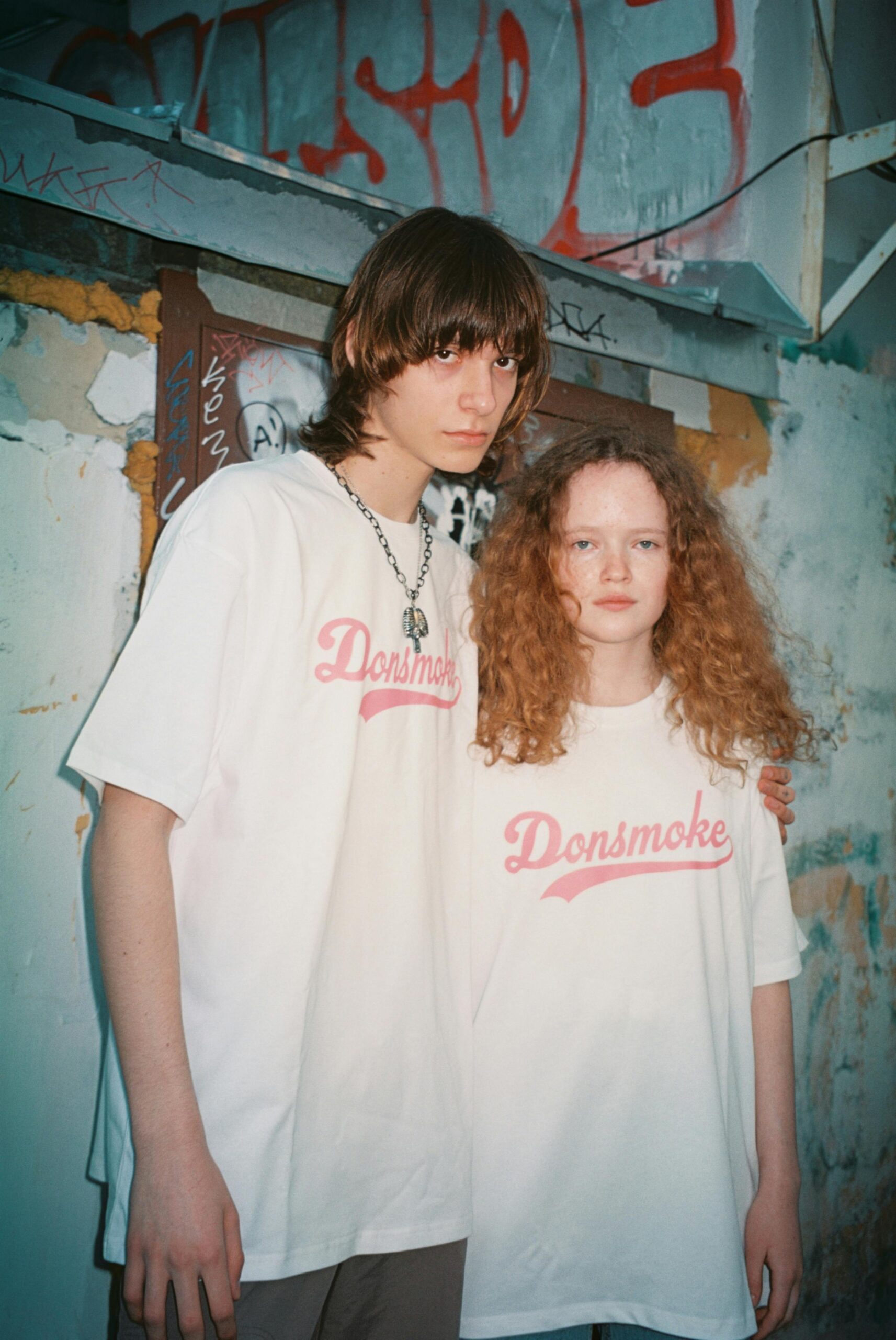 An unhappy teenage couple posing for a photo | Source: Pexels