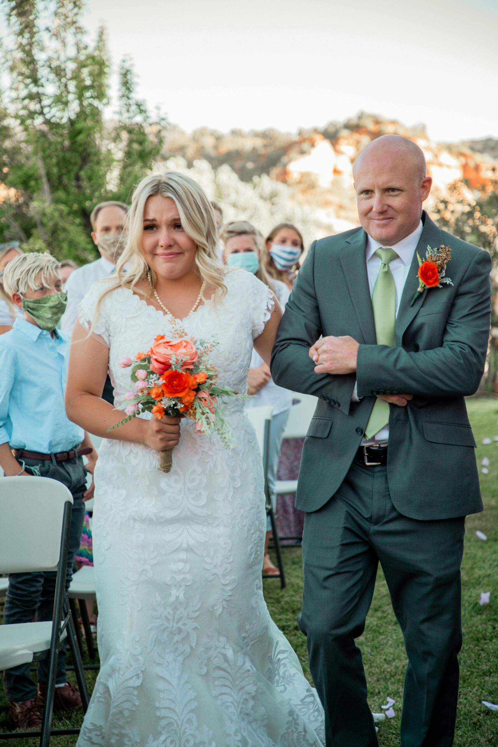 A bride walking down the aisle with a man | Source: Pexels