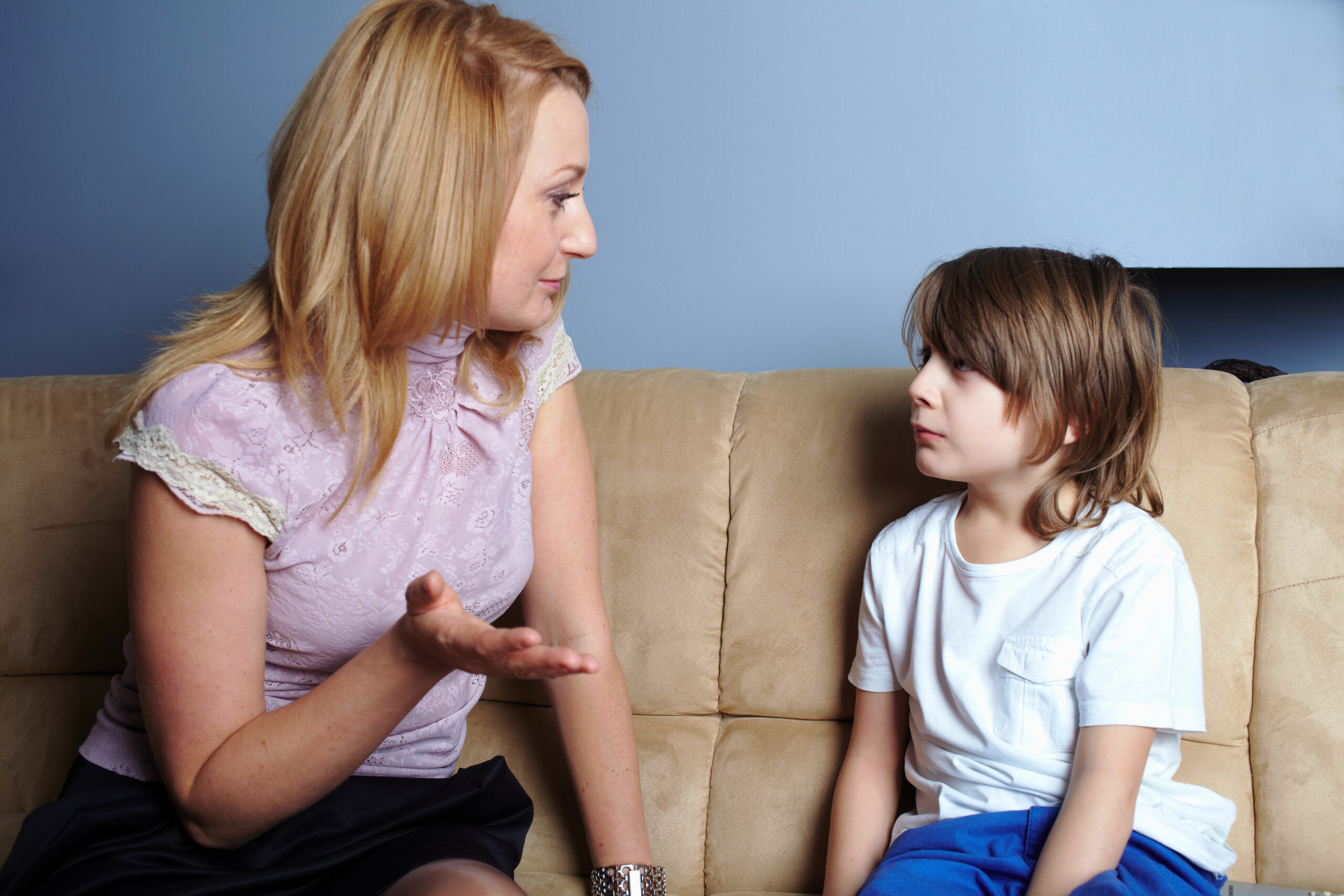 Mother talking to her young son | Source: Shutterstock