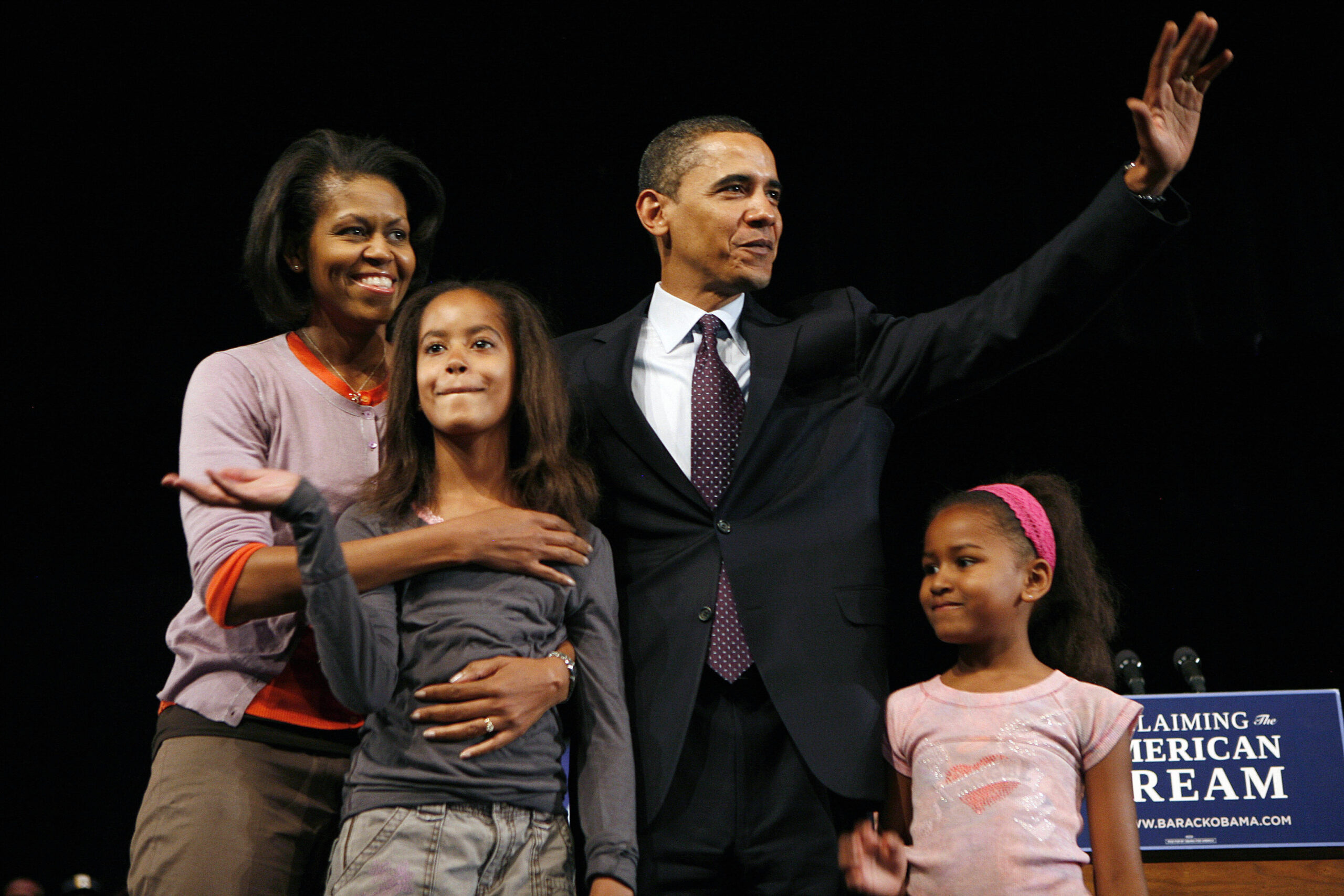 The daughters of the former president faced public comparison to their famous parents from the very beginning of the historic campaign. In this photo, the then-presidential candidate Barack Obama, his wife Michelle, and daughters Malia and Sasha Obama stood together after a campaign speech at Lawrence North High School on May 3, 2008, in Indianapolis, Indiana.