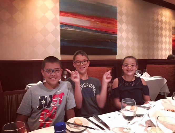 Despite the problems with their parents, the children's childhood often seemed normal. In this photo, three of the kids, including Collin, smiled together at a restaurant on July 23, 2017.