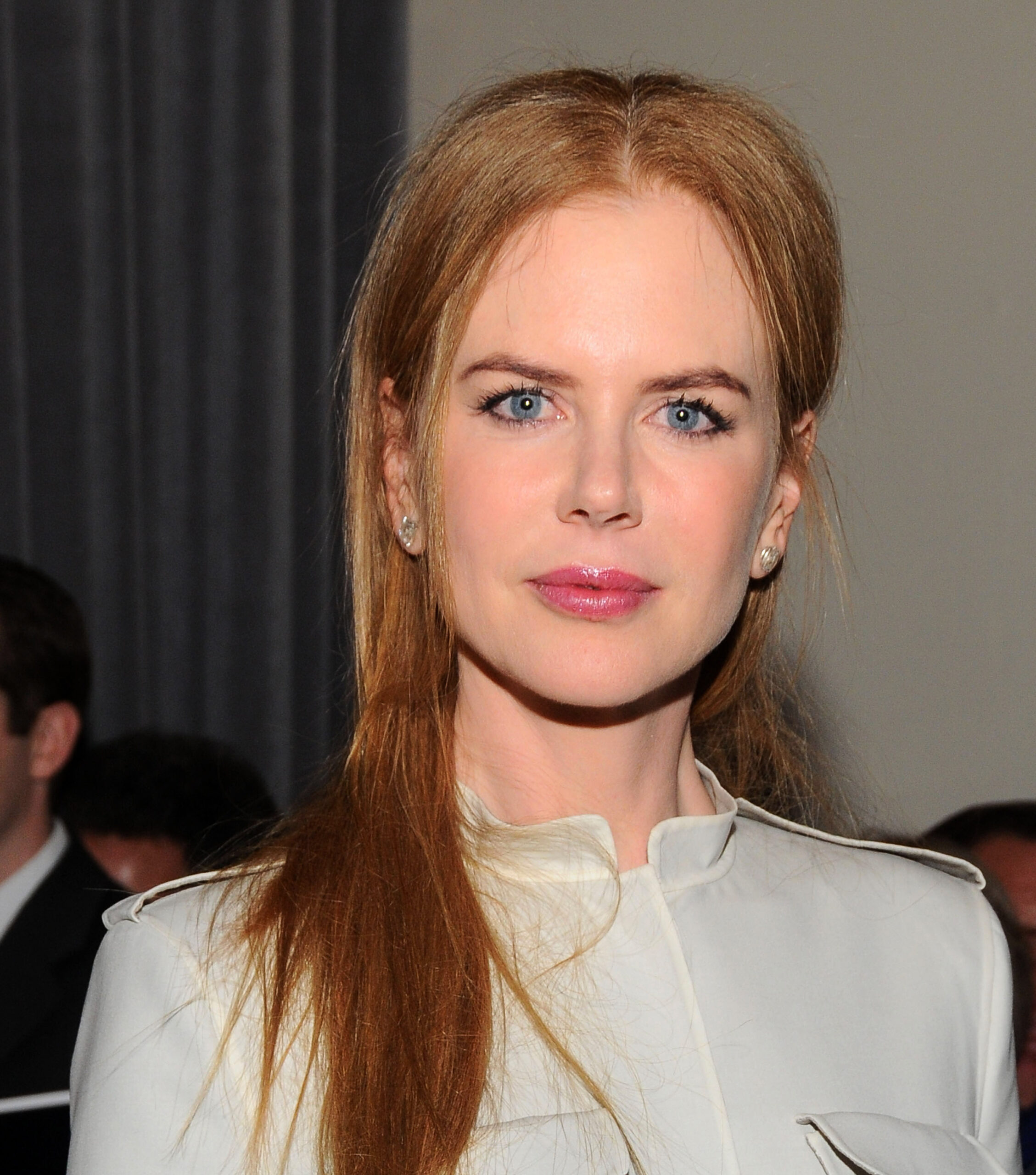 A gathered low hairstyle and a structured, high-necked white jacket defined her look at the Family Violence Prevention Fund ceremony on January 8, 2010. Her immaculately smooth forehead and full, line-free complexion continued to fuel the public debate surrounding cosmetic enhancements.