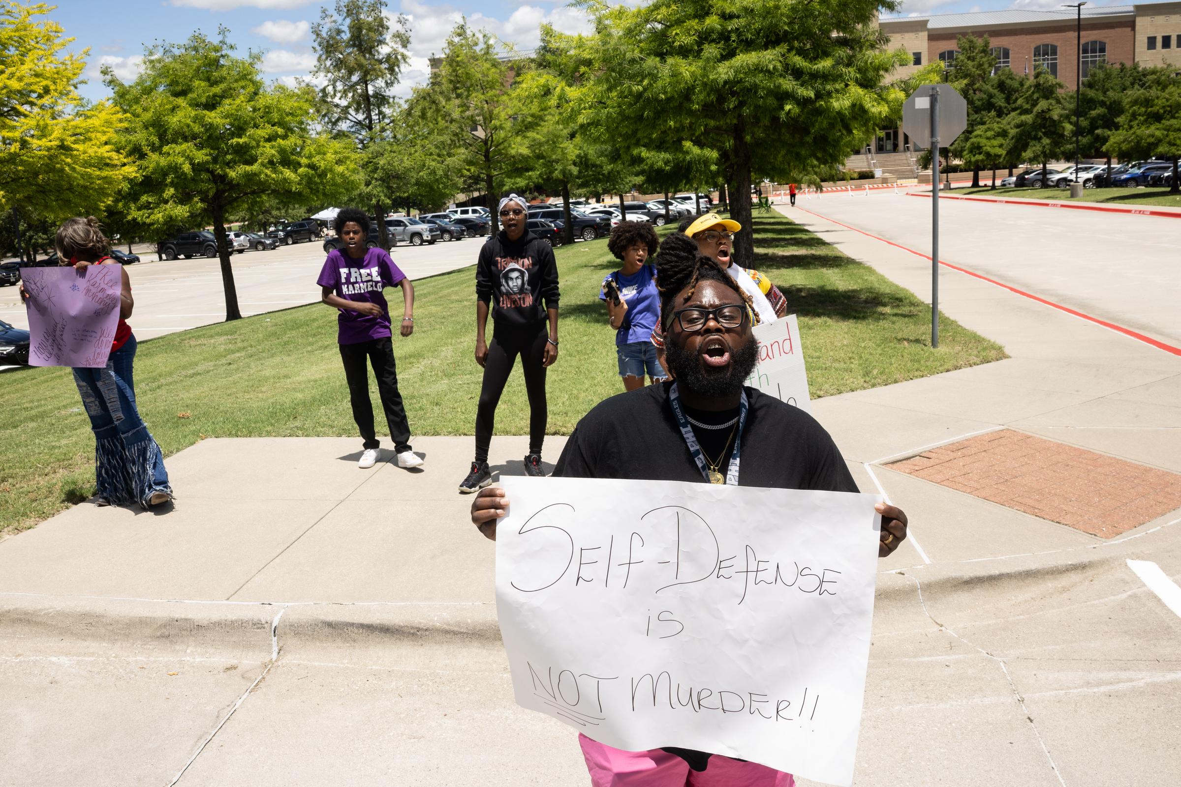Karmelo Anthony's extended family member Michael Wilson, front, of Fort Worth and other supporters of Anthony chant outside of the Collin County Courthouse as Anthony's murder trial is underway in McKinney, TX, Saturday, June 6, 2026.