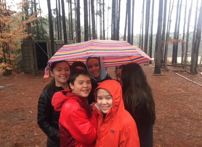 Kate used her platform to keep promoting her reality television show. In this photo, she and her children posed together in the rain on October 1, 2019.