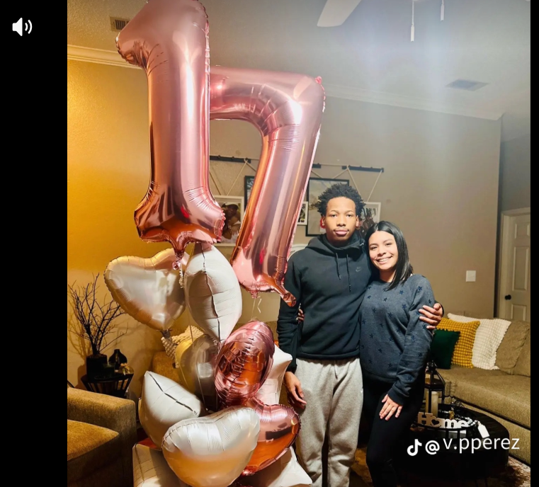 Karmelo Anthony and his girlfriend pose together beside large "17" balloons in one of the personal photos included in her TikTok slideshow.