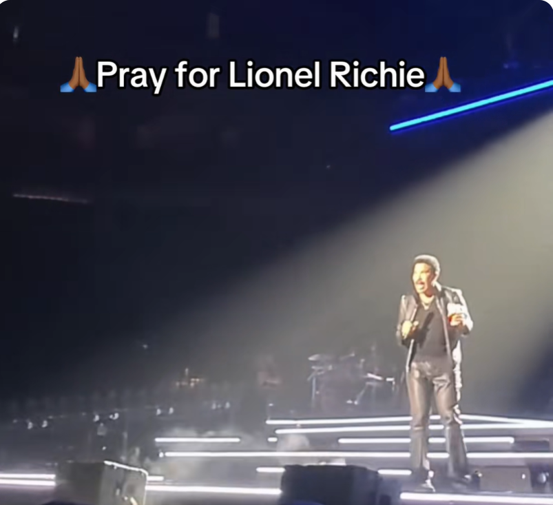 Lionel Richie performs under a spotlight at Grand Casino Arena in St. Paul, Minnesota, on June 25, 2026, as fans recorded the moment he acknowledged feeling unwell during "Dancing on the Ceiling."