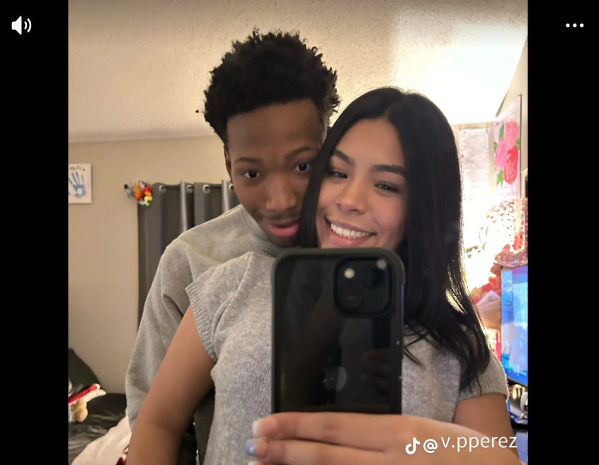 Karmelo Anthony and his girlfriend pose for a mirror selfie in one of the photos featured in her emotional slideshow.