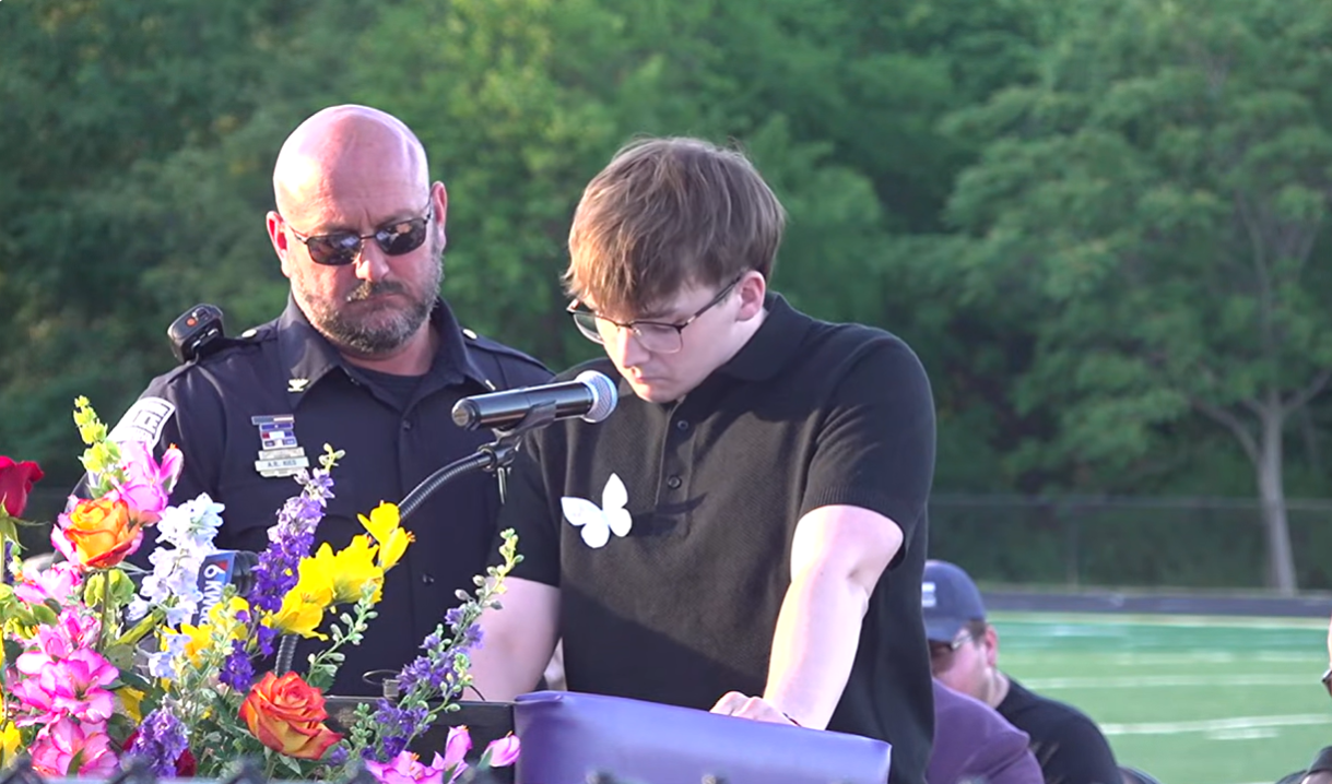 Johnathan McFarland pauses while speaking during a community vigil for his family members killed in the Muscatine, Iowa, shooting spree, June 3, 2026. The 22-year-old, who was the sole surviving sibling, thanked supporters and paid tribute to his loved ones during emotional remarks.