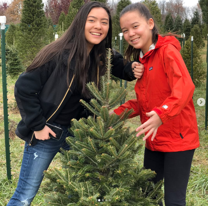 Their father eventually moved on to a new chapter in his life. In this photo, two of the girls posed together as teenagers on December 3, 2017.