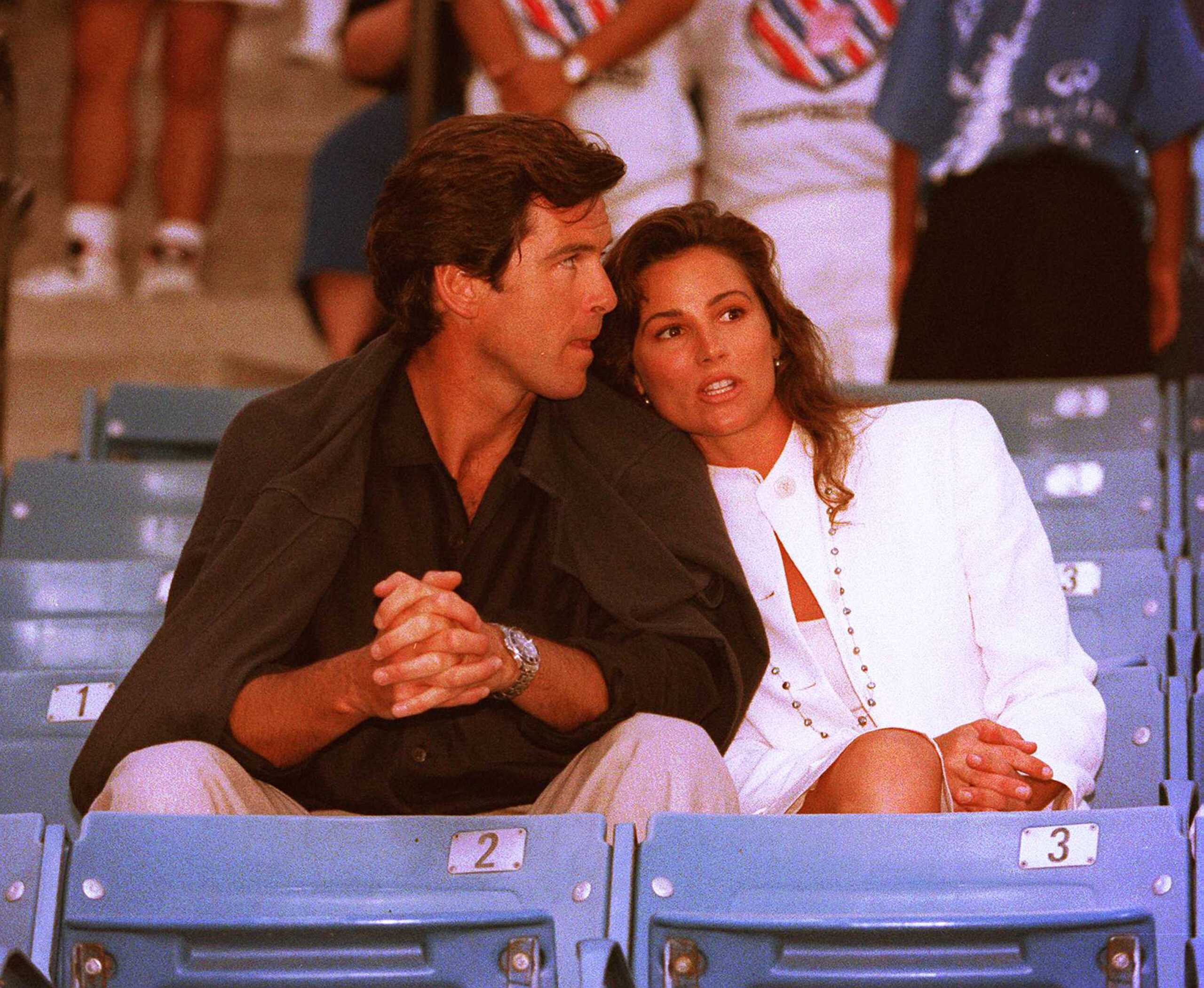 Pierce Brosnan and Keely Shaye Smith at the Infiniti Tennis Tournament on July 31, 1995, in Westwood, California.