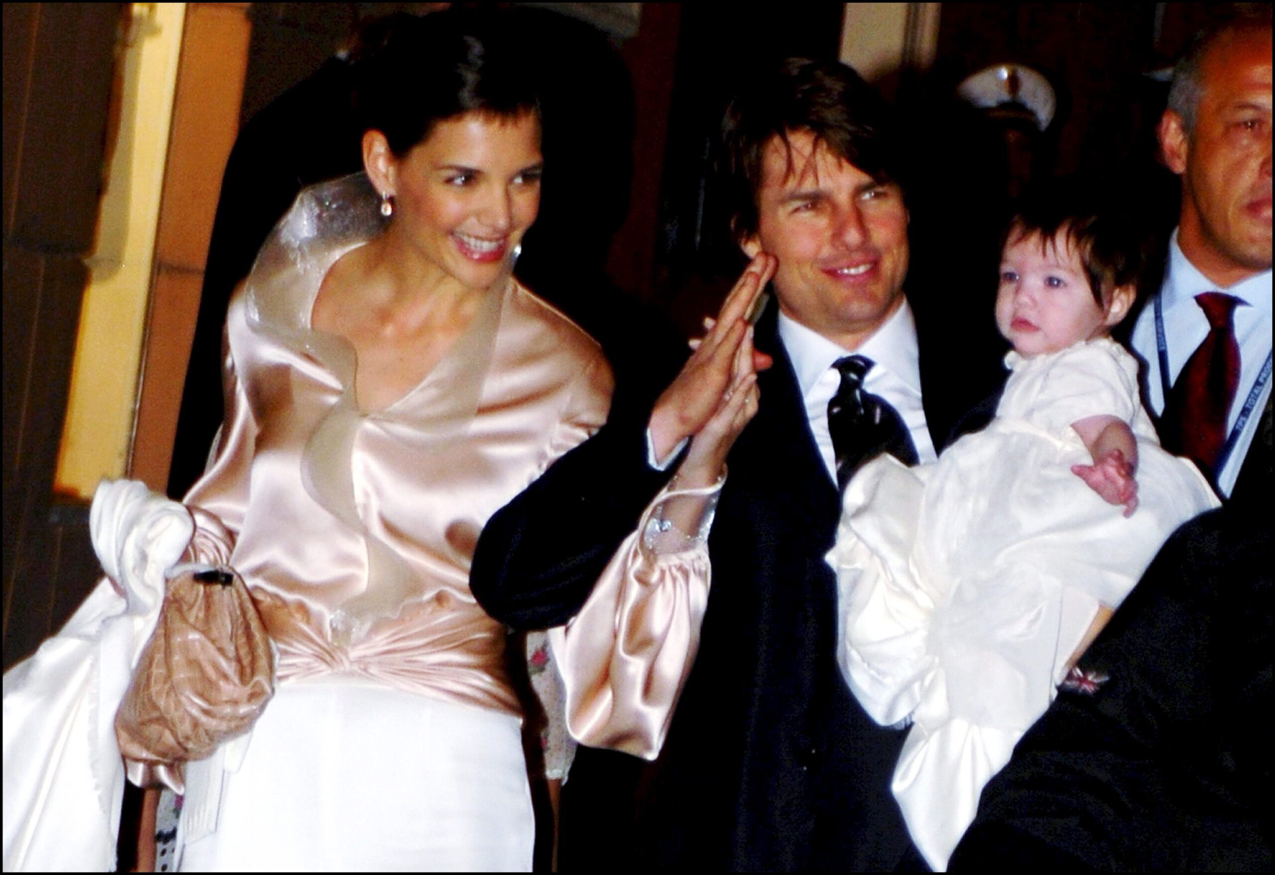 Tom Cruise and Katie Holmes with their daughter Suri Cruise at the restaurant "Nino" in Rome, Italy, on November 16, 2006.