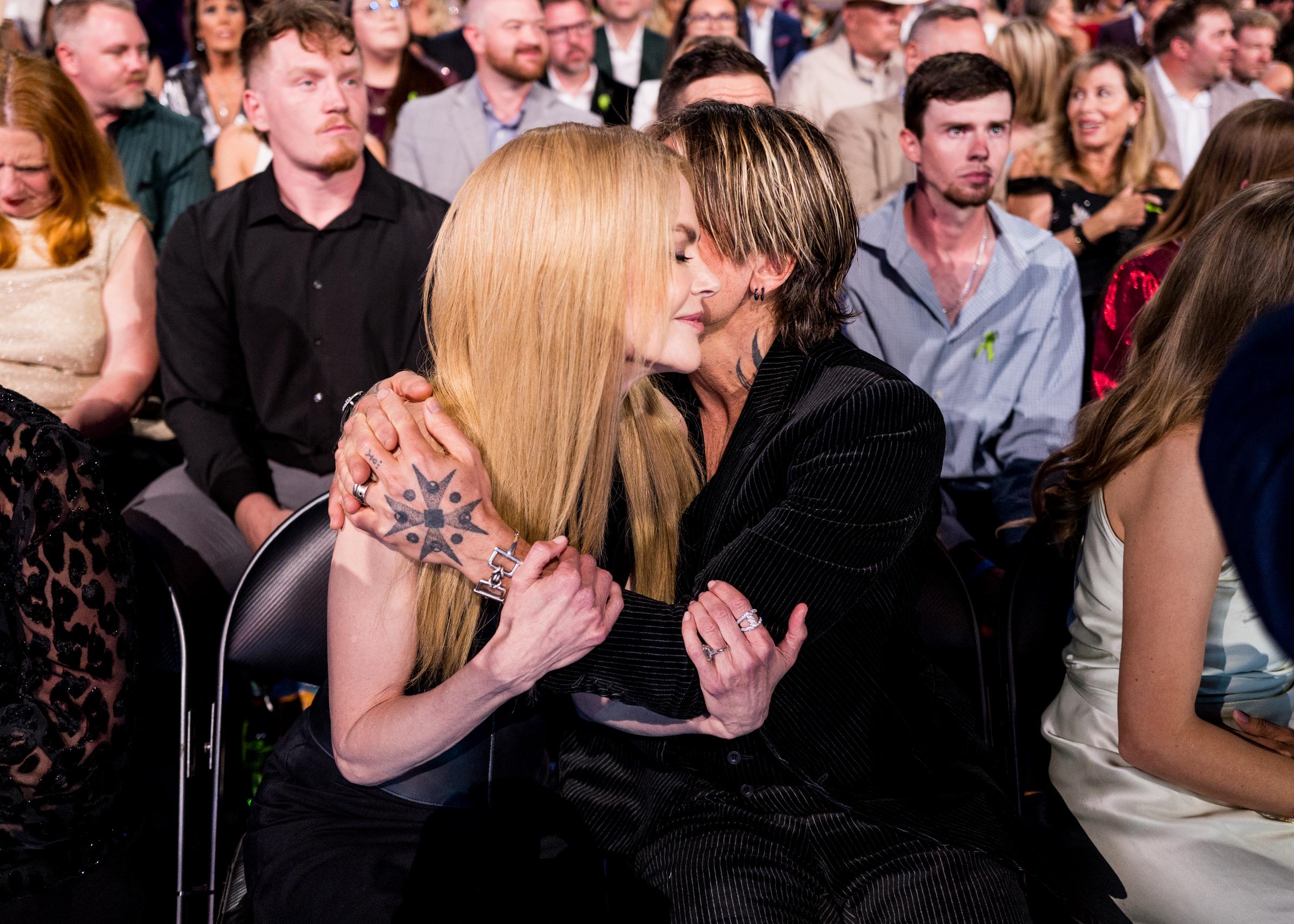 Keith Urban embraces Nicole Kidman in the audience at the 60th Academy of Country Music Awards in Frisco, Texas, on May 8, 2025.