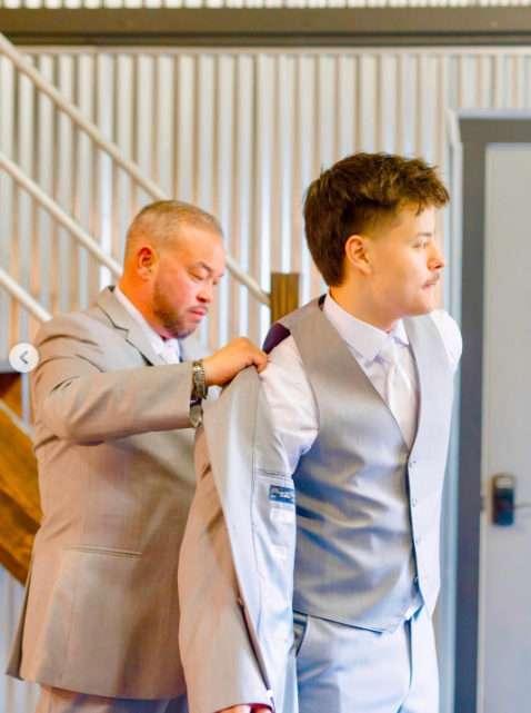 Collin served as a groomsman in his father's wedding. On this occasion, Jon was helping him with his jacket, posted on June 21, 2026.