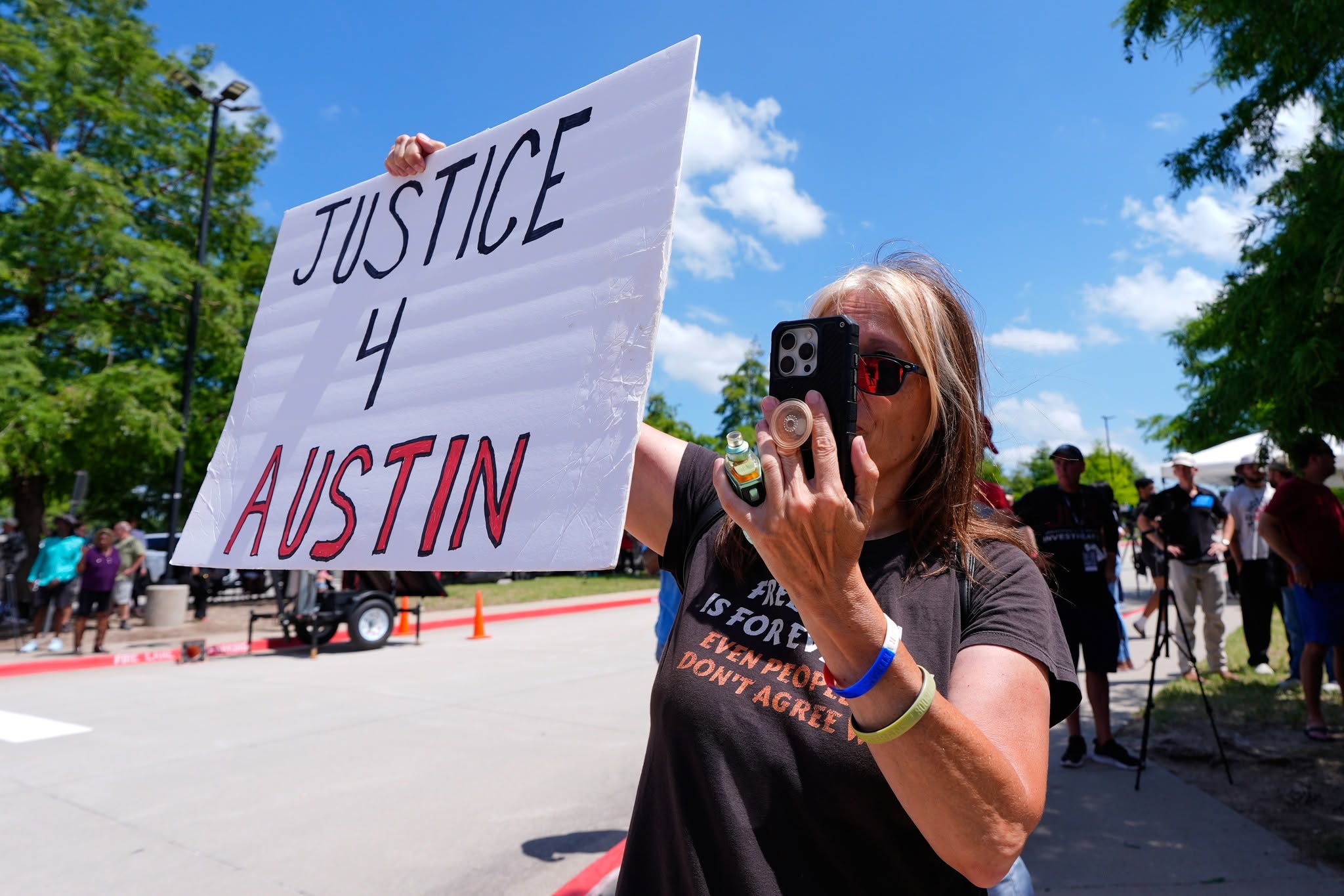 Support for Austin's family also appeared publicly as the case moved forward. The dueling demonstrations showed how deeply the tragedy affected the community.