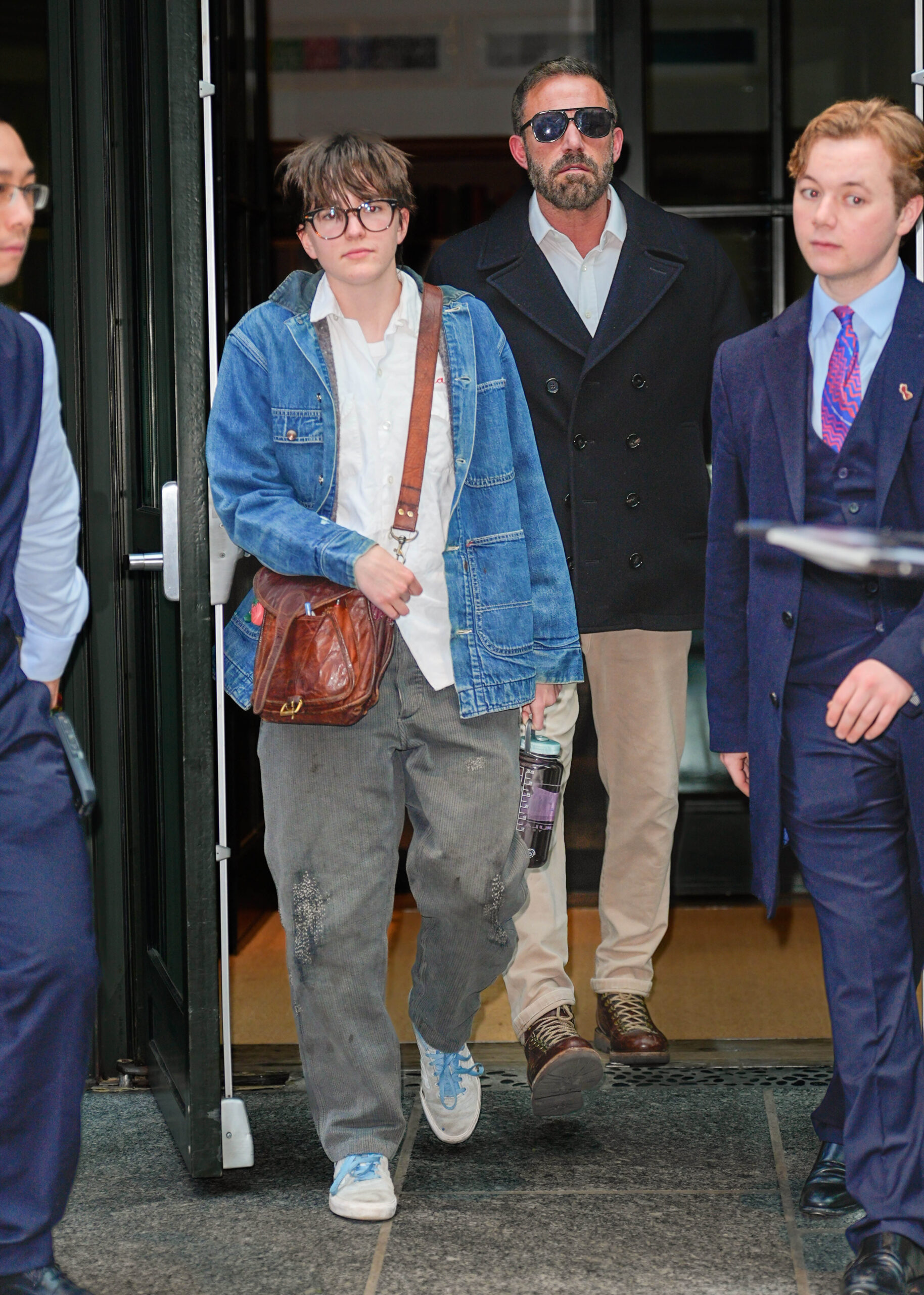 Ben Affleck walks behind one of his children in New York City. The actor has said he and Jennifer Garner want their children to have the freedom to decide their own futures rather than feel pressured to follow their parents into Hollywood.