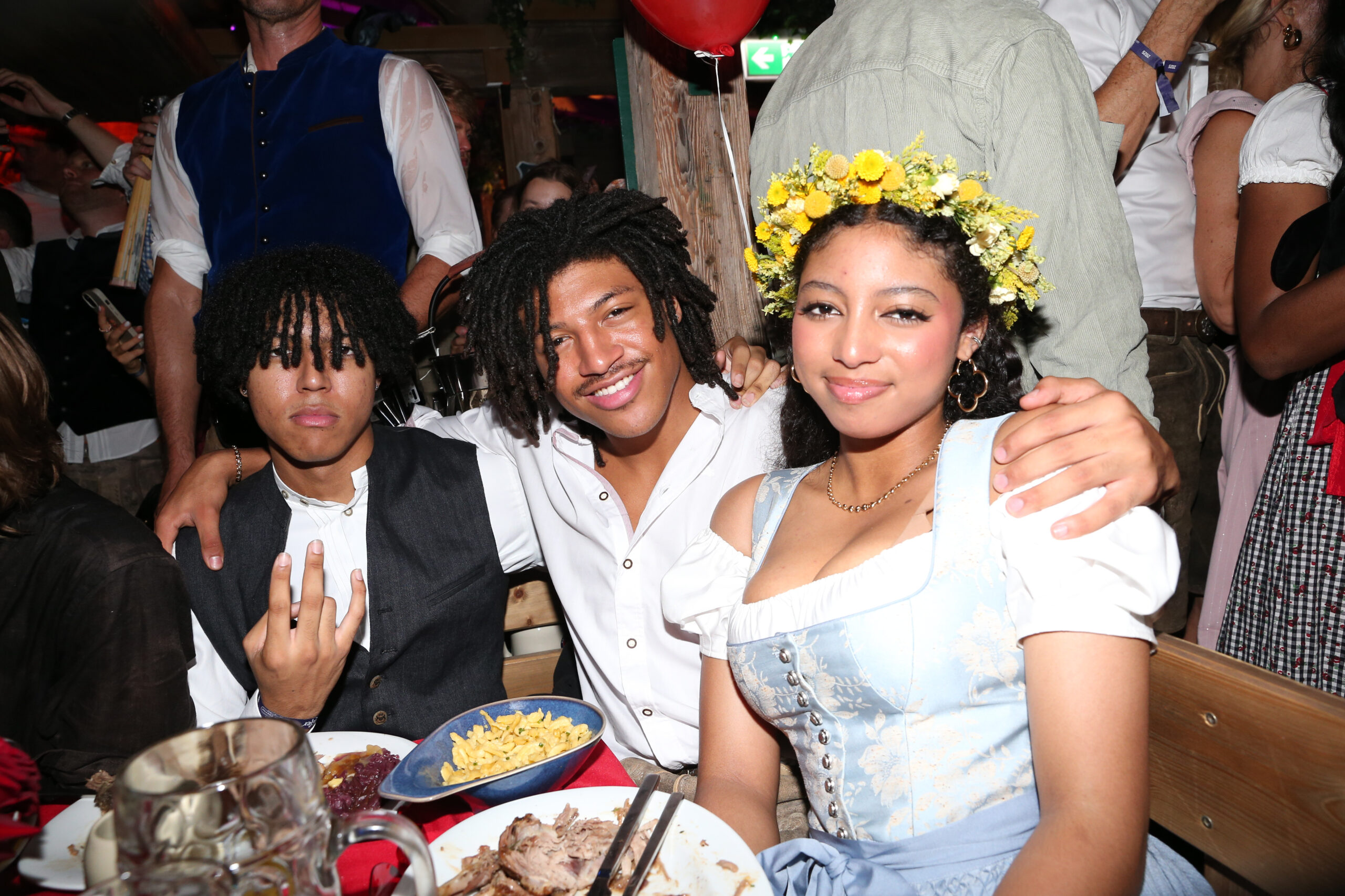 Johan Samuel, Henry Samuel, and Lou Klum during the Oktoberfest (Wiesn) opening at Käfer Wiesn-Schänke Theresienwiese on September 20, 2025