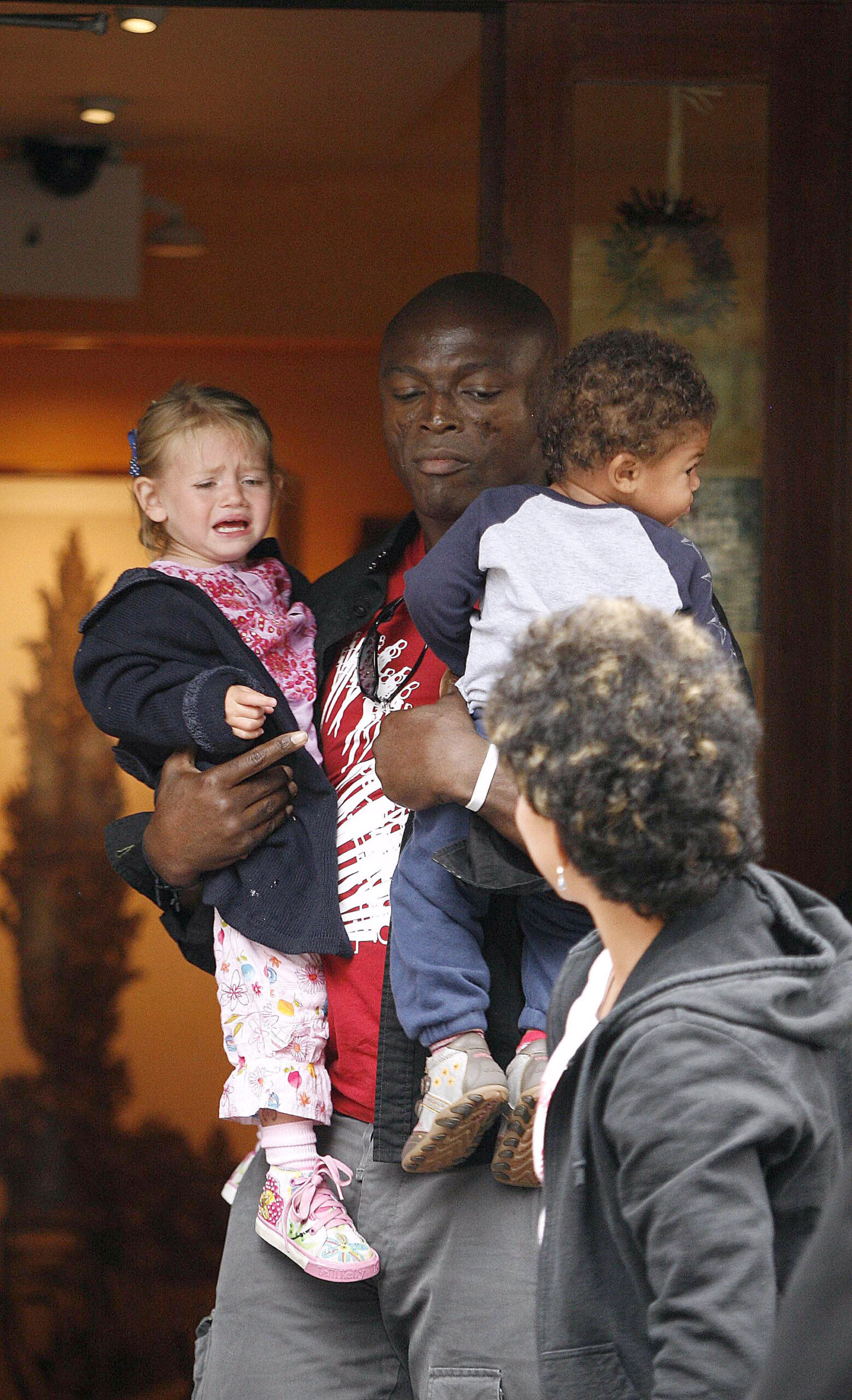 Seal spotted holding his children Henry Samuel and Leni Klum in New York City on August 6, 2006.
