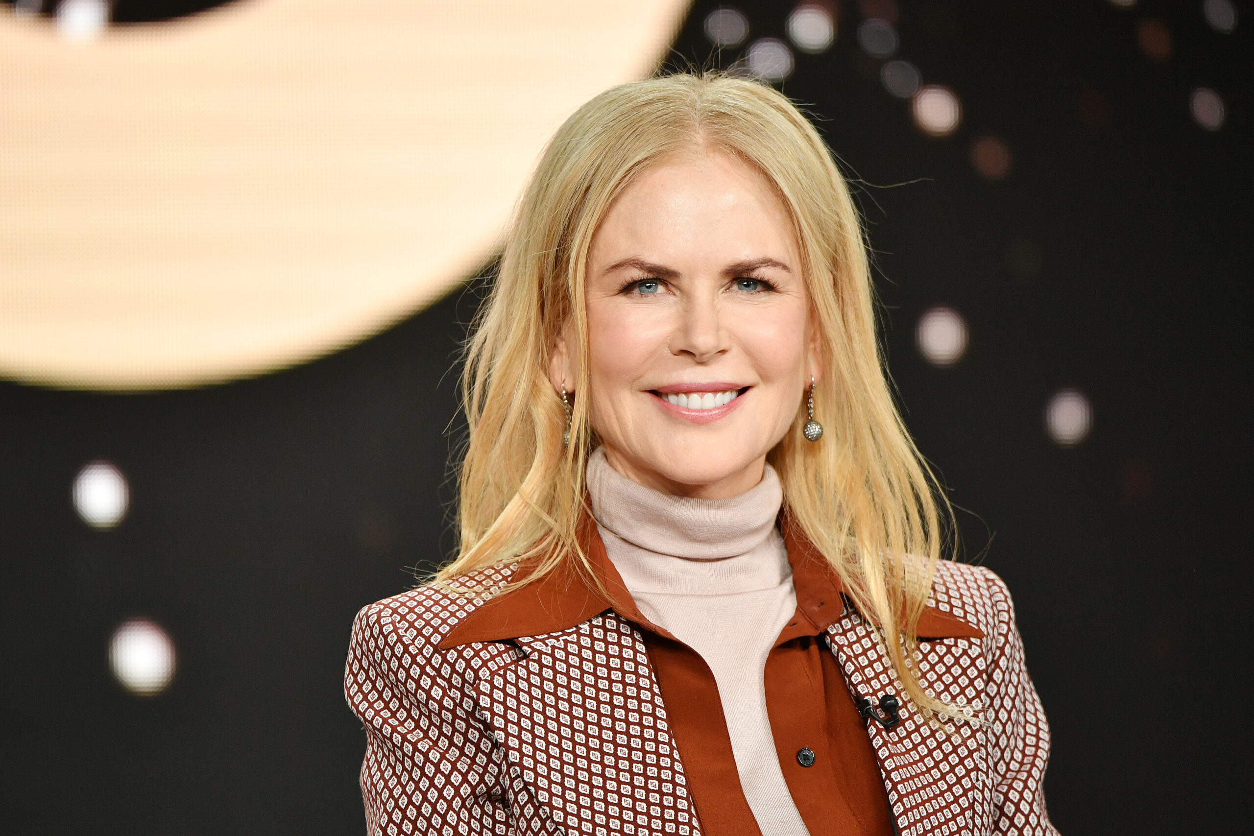 At the 2020 Winter TCA Press Tour captured in this photo, her forehead remains remarkably smooth and her cheeks retain a distinctly full volume, though her expression shows a softer appearance with visible crinkling around the eyes as she smiles.