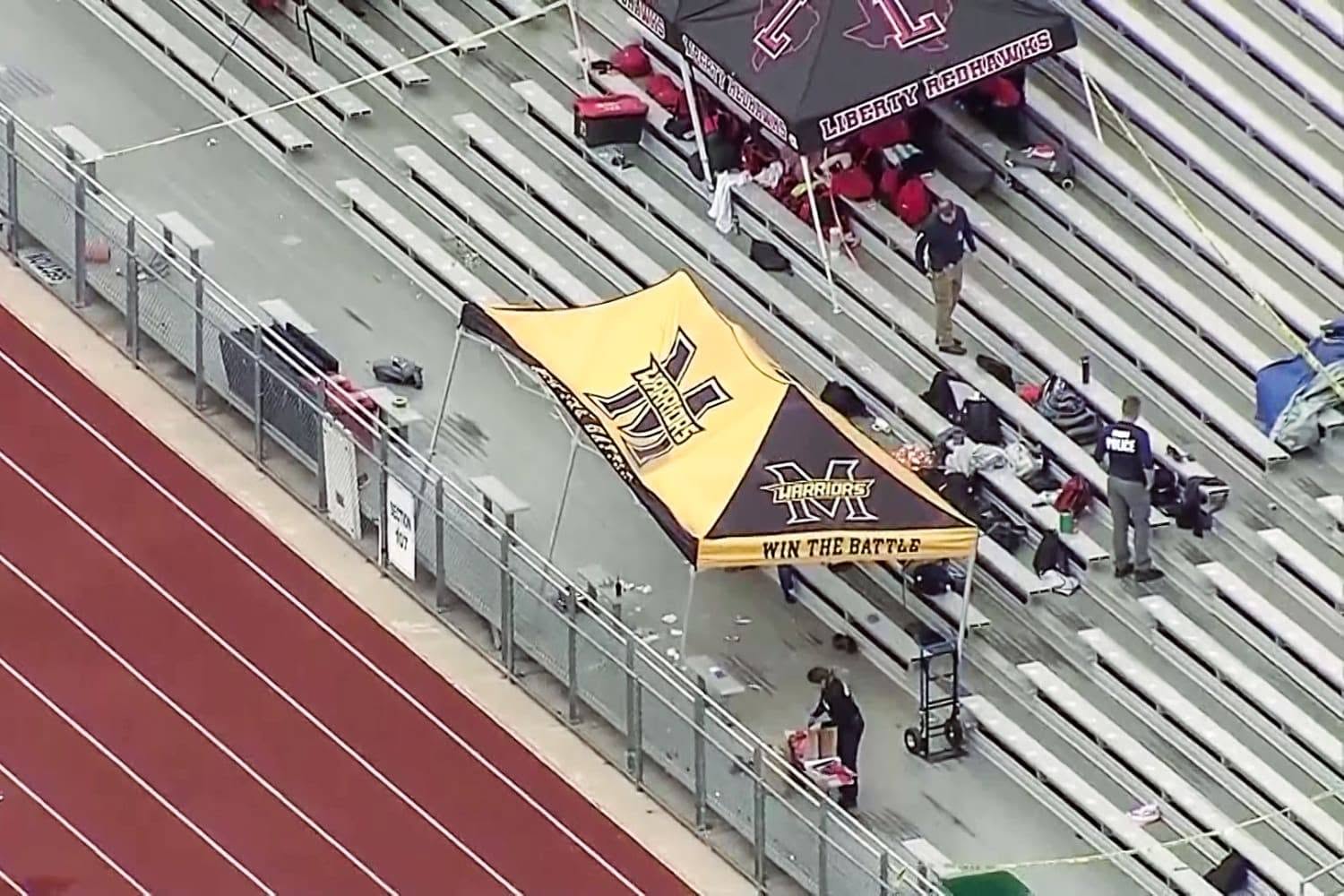 The stadium setting became central to the case because the confrontation happened under a school tent in the bleachers. Surveillance footage later focused on that same area from a distant, high-angle view.