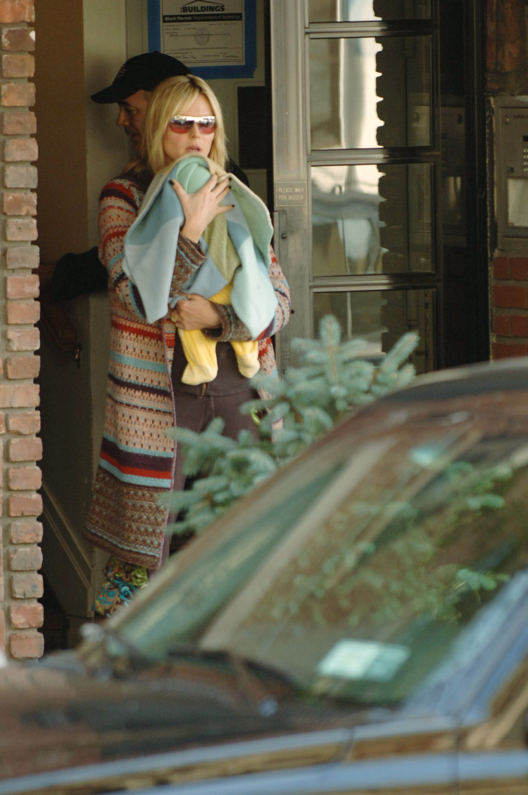 Heidi Klum spotted holding her son Henry Samuel on November 1, 2005, in New York City.