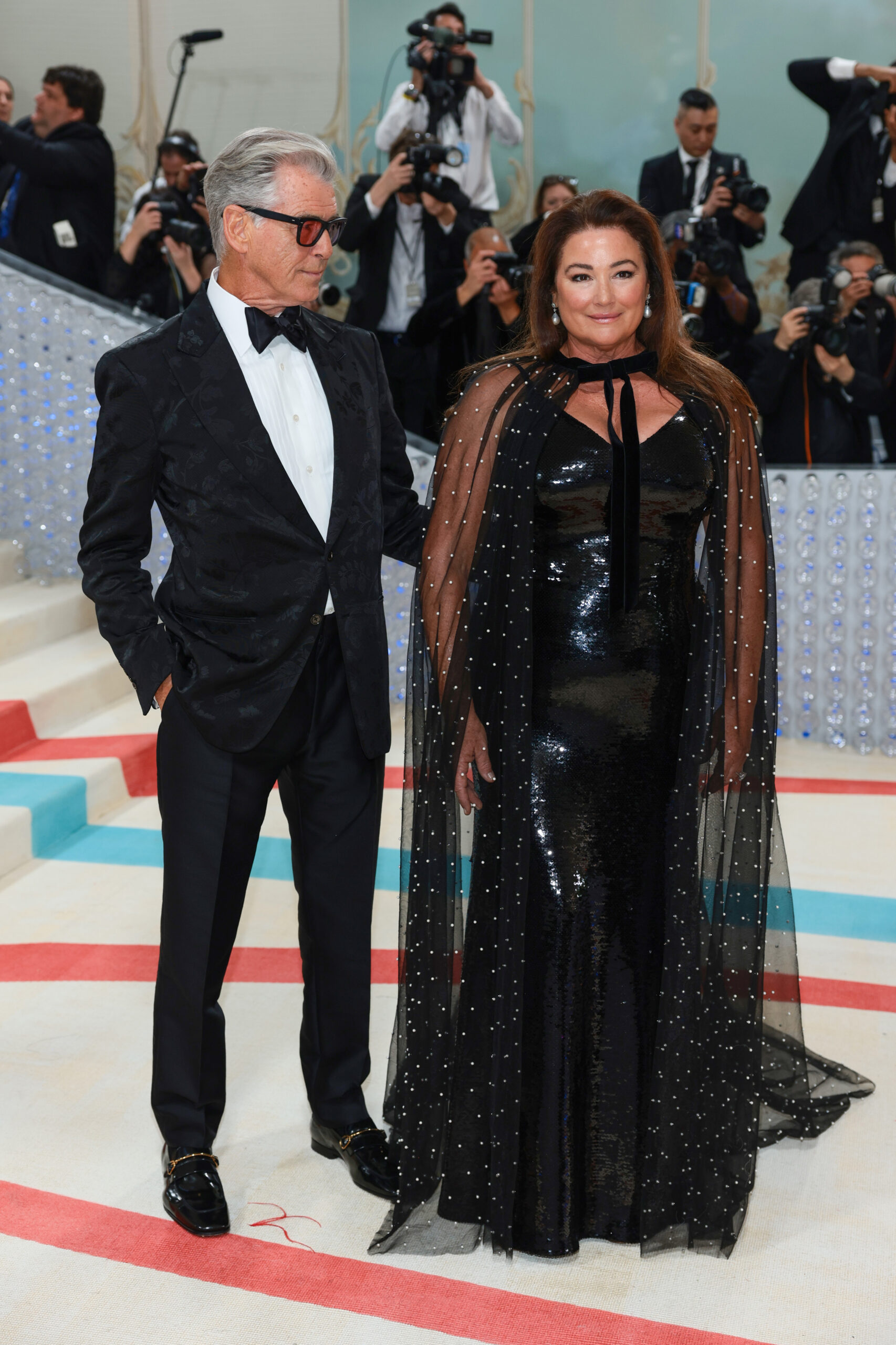 Pierce Brosnan and Keely Shaye Smith attend the Met Gala Celebrating "Karl Lagerfeld: A Line Of Beauty" on May 1, 2023, in New York City.