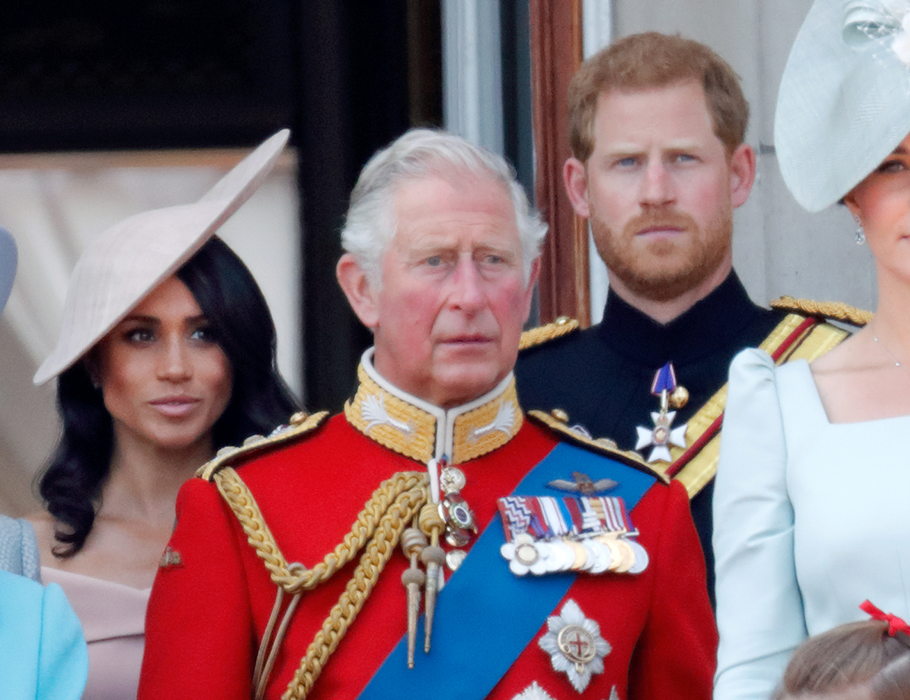 Meghan, King Charles, and Prince Harry stand on the balcony of Buckingham Palace during Trooping The Colour 2018 on June 9, 2018 in London, England
