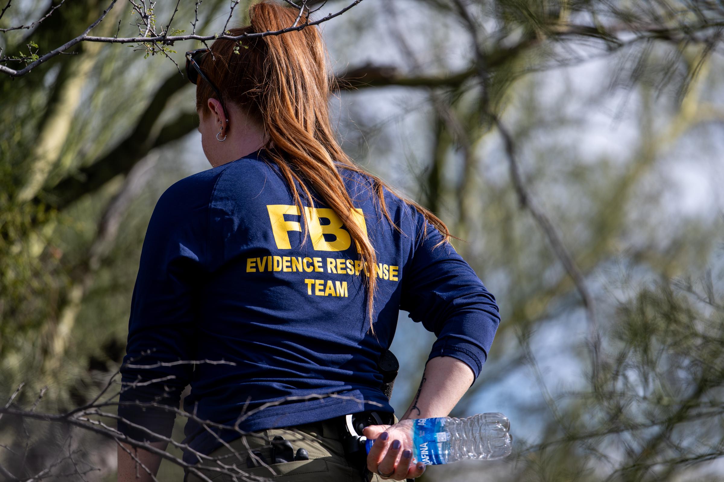 As the search stretched on, federal investigators combed areas around Nancy's home for physical clues that could move the case forward. The investigation increasingly depended on small traces — from DNA to surveillance footage — that might connect the masked subject to the scene.