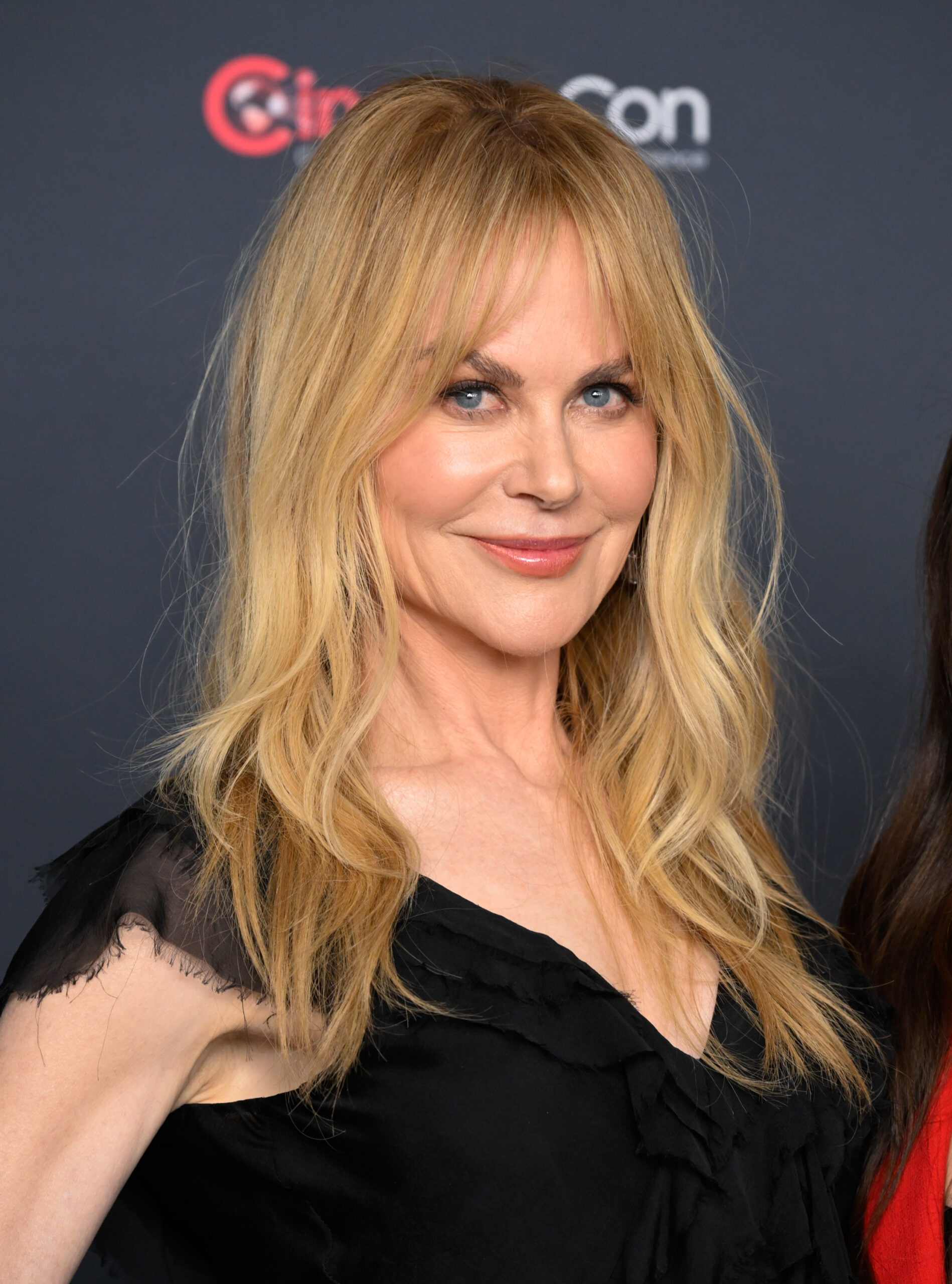 At the 2026 CinemaCon presentation, her complexion featured a combination of prominently full cheeks and visible, natural crinkling around her eyes and lower face as she smiled. While her features maintained a distinctly smooth, high-volume appearance, the fine expression lines offered a softer quality compared to her most intensely taut eras.