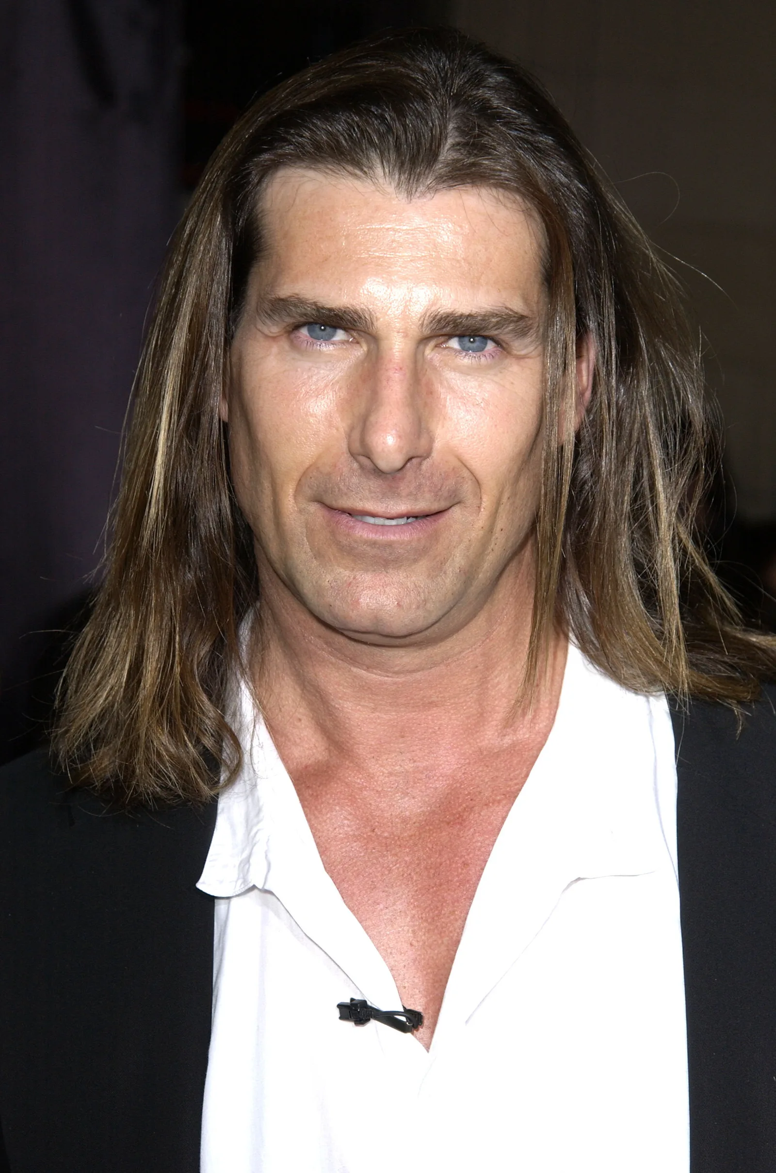 Over the years, he only became more handsome and in high demand among women. In this photo, he attended the premiere of "Shanghai Knights" in Hollywood, California, on February 3, 2003.