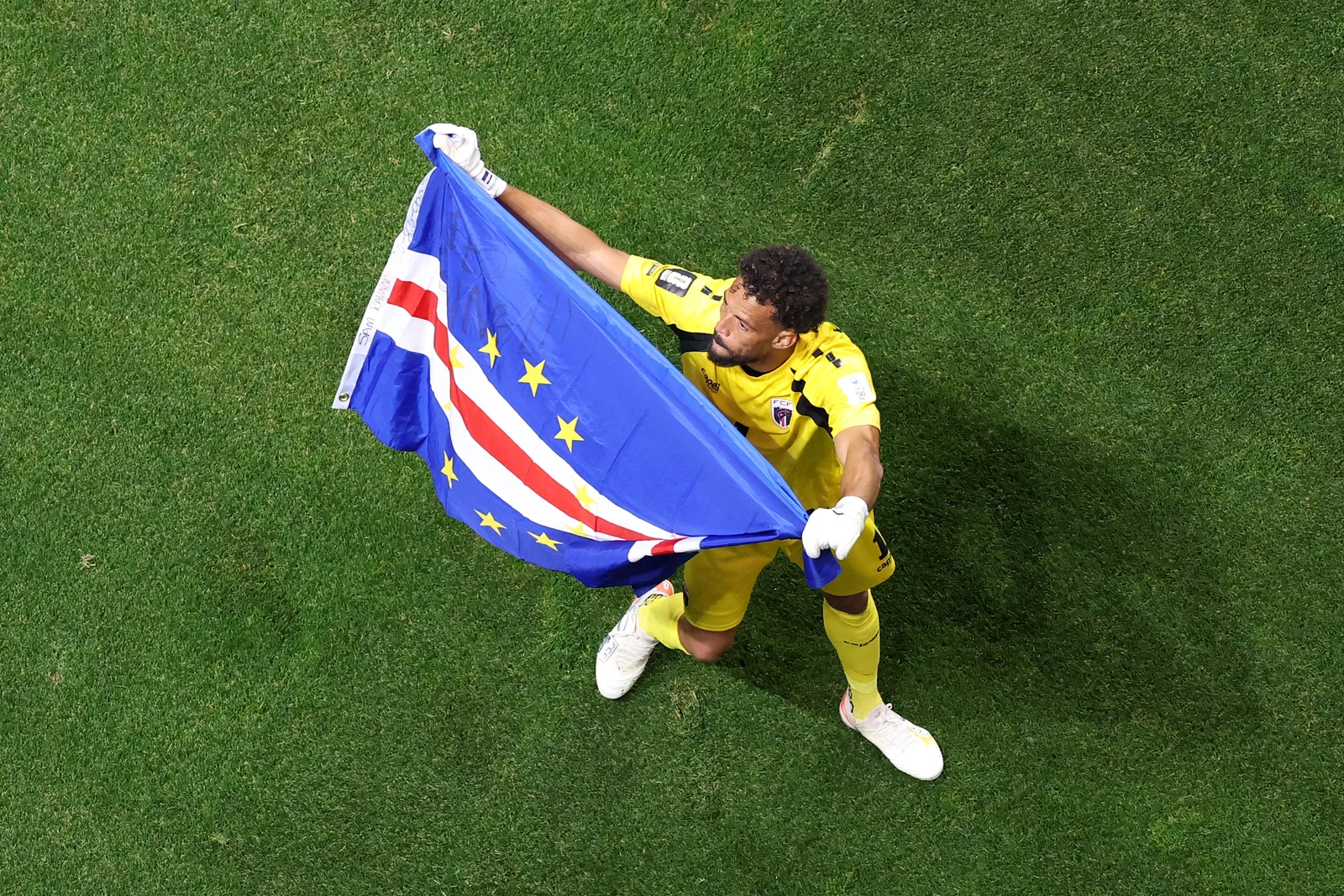 Vozinha waves the Cape Verde flag after the 0-0 draw during the FIFA World Cup 2026 Group H match between Spain and Cape Verde at Atlanta Stadium on June 15 in Georgia.