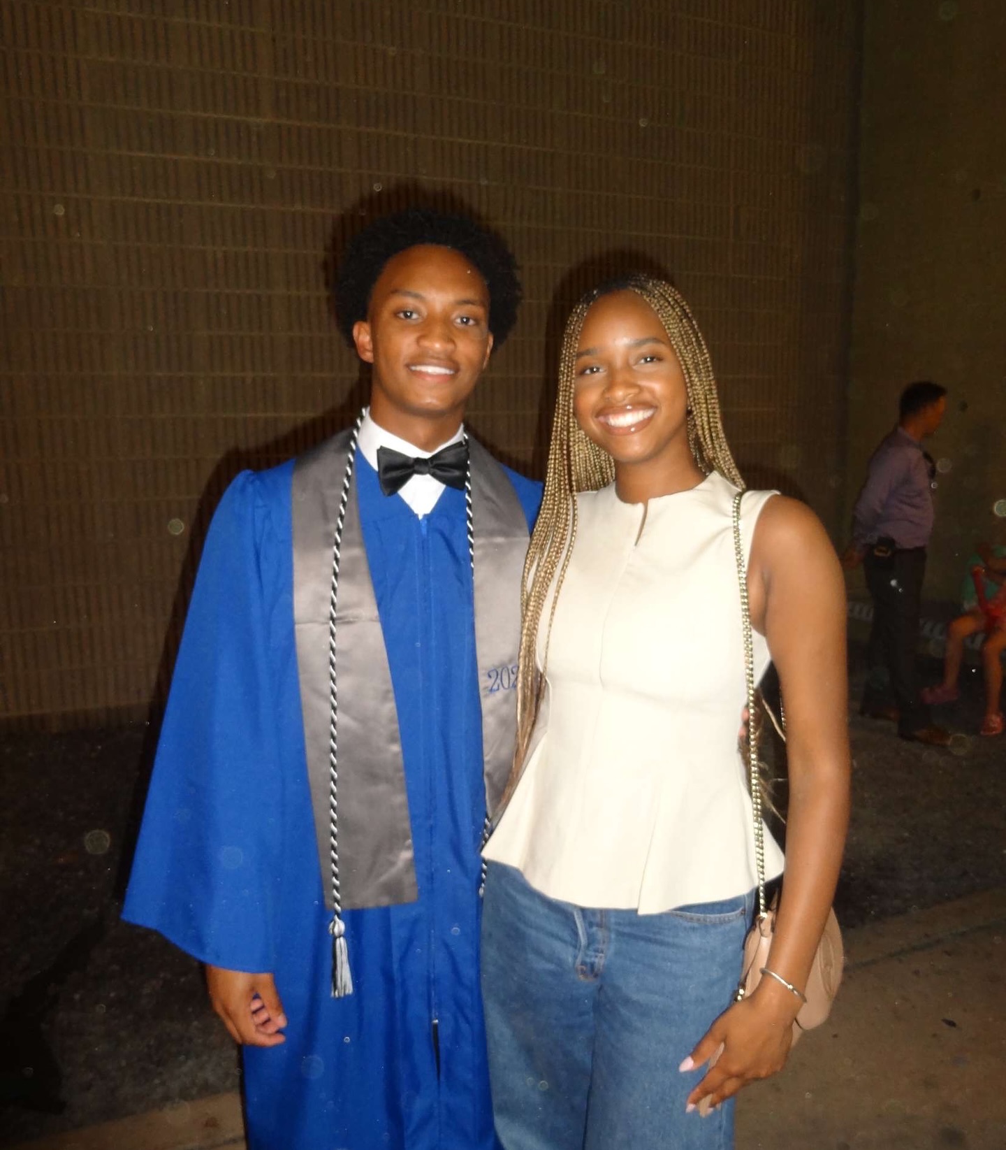 The graduation-era images in the carousel underscored how young Wells was and how much life appeared to be ahead of him. That contrast has made the speculation around his death feel even more unsettling.