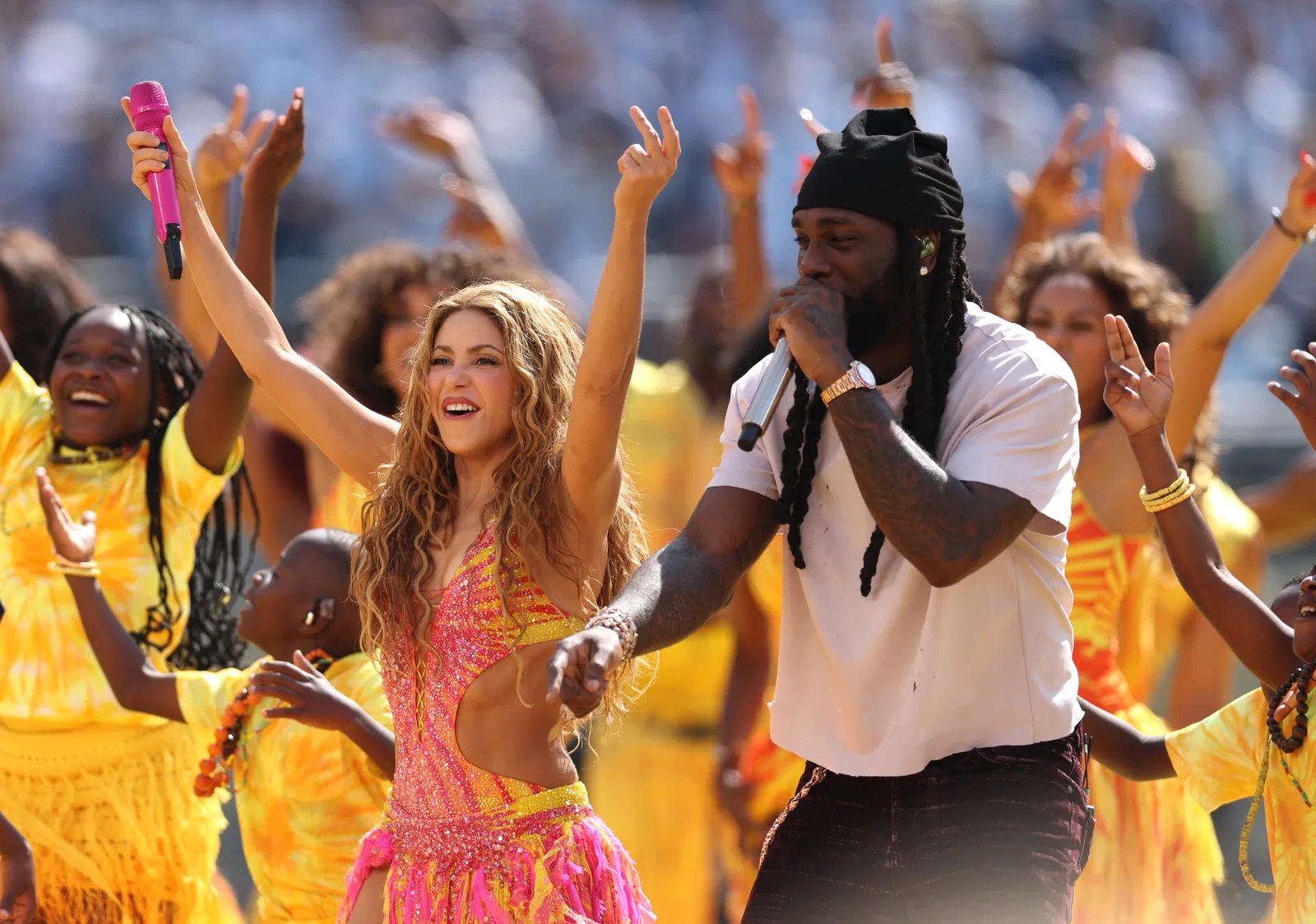 Shakira performs with an ensemble of dancers at New York New Jersey Stadium, bringing the intense, barefoot choreography to the Topps Final Halftime Show that had viewers buzzing online about her unparalleled energy.