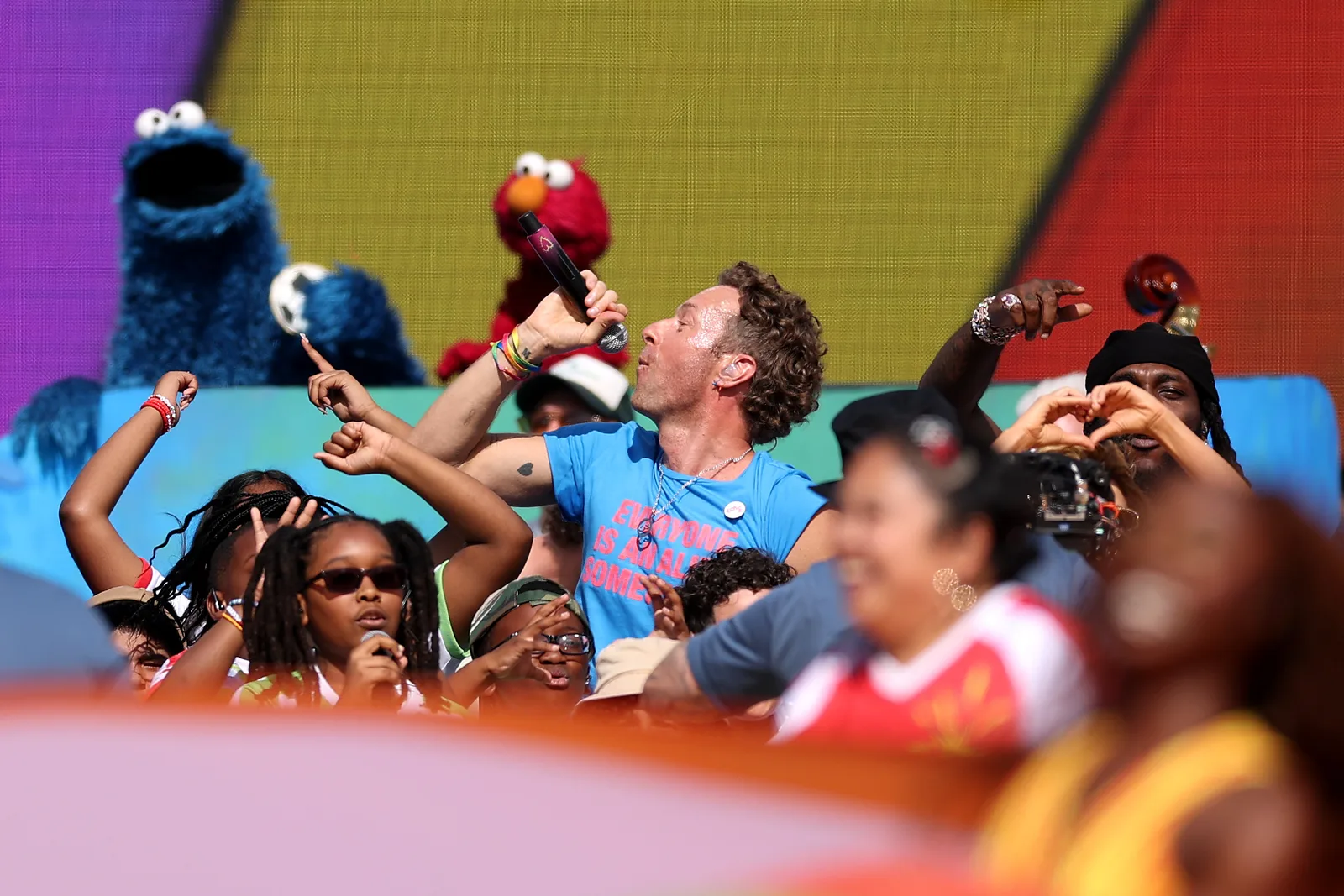 Chris Martin's role extended beyond curating the halftime show's musical lineup. The production also incorporated Global Citizen's education campaign, with appearances by Sesame Street characters and children helping reinforce the event's broader message.