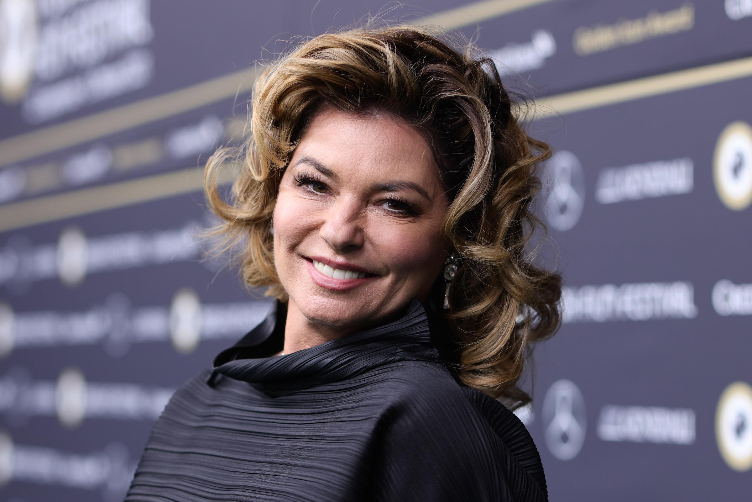 This close-up shows Twain with softer, voluminous styling and a polished red-carpet glow. It captures a moment when fans were already noticing how her beauty and presentation had continued to shift with time.