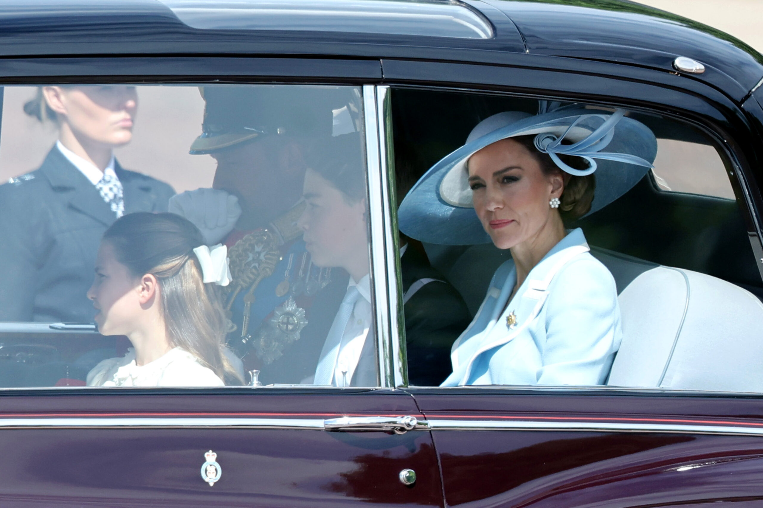 The royal children were seen in the car along with their parents. In this photo, there's Princess Charlotte of Wales, Prince William, Prince of Wales, and Prince George of Wales riding in a car toward Trooping the Colour at Buckingham Palace on June 13, 2026, in London, England.