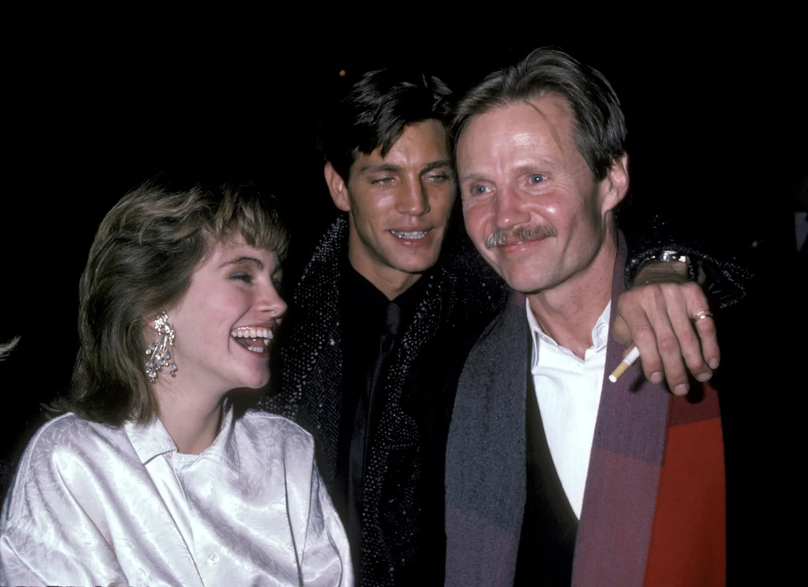 The actor and his sister with Jon Voigt at the premiere of "Runaway Train" and "Fool For Love" in 1985.