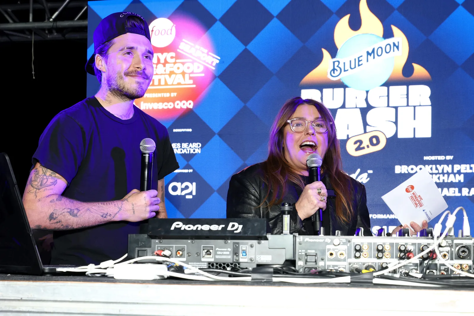 Rachael Ray speaks on stage alongside Brooklyn Beckham while co-hosting the Blue Moon Burger Bash 2.0 on October 17, 2025
