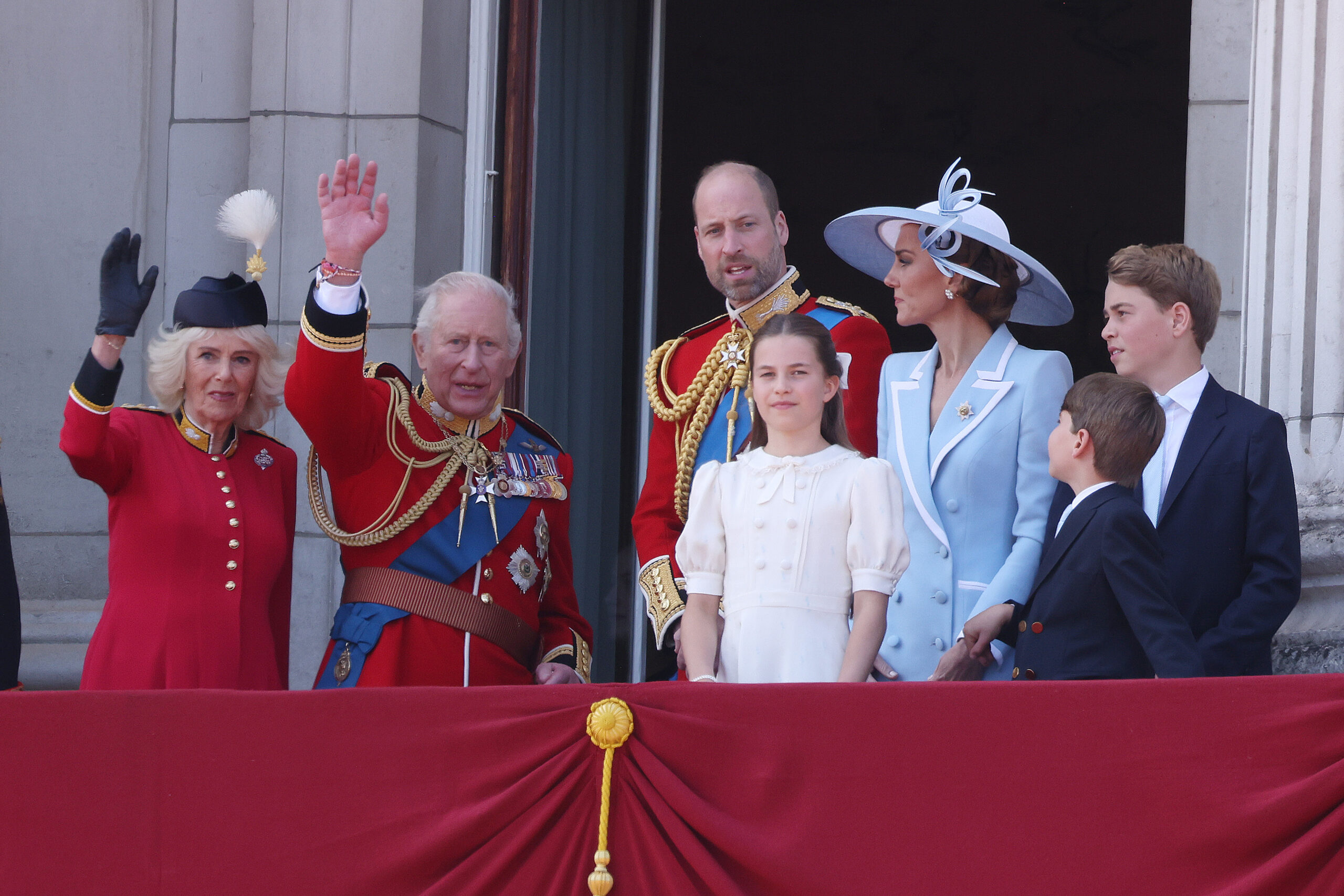 The core members of the royal family gathered together to watch the spectacular flypast from the balcony. Queen Camilla, King Charles III, Prince William, Prince of Wales, Catherine, Princess of Wales, Princess Charlotte of Wales, Prince Louis of Wales, and Prince George of Wales stood on the balcony for Trooping the Colour at Buckingham Palace on June 13, 2026, in London, England.