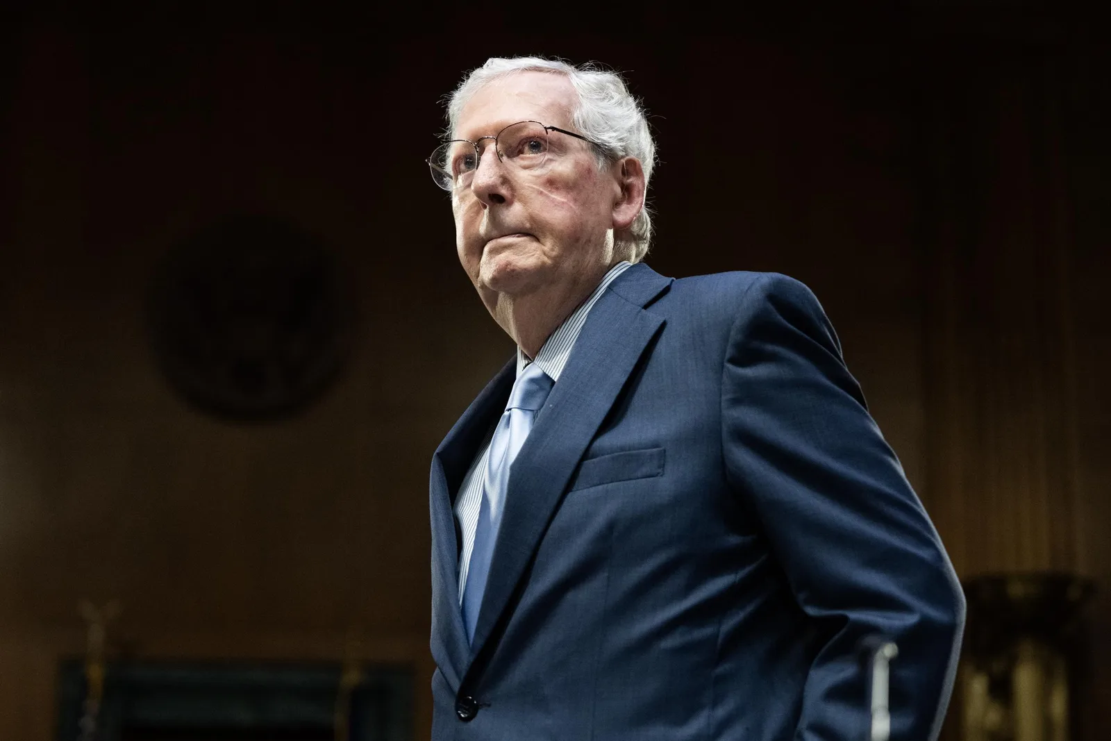The person on the stretcher, identified by another witness as McConnell, wore no oxygen mask. Strangely, the emergency vehicles departed without sirens.