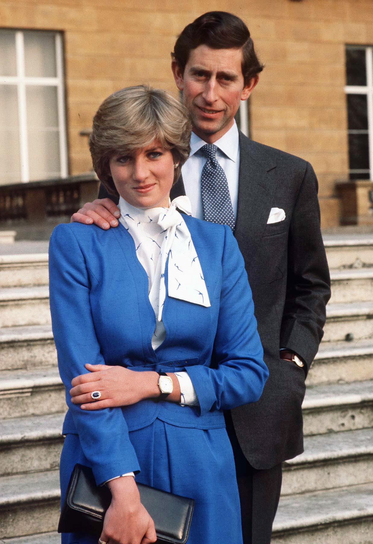 Diana, Princess of Wales, and King Charles III during their engagement announcement at Buckingham Palace in 1981.