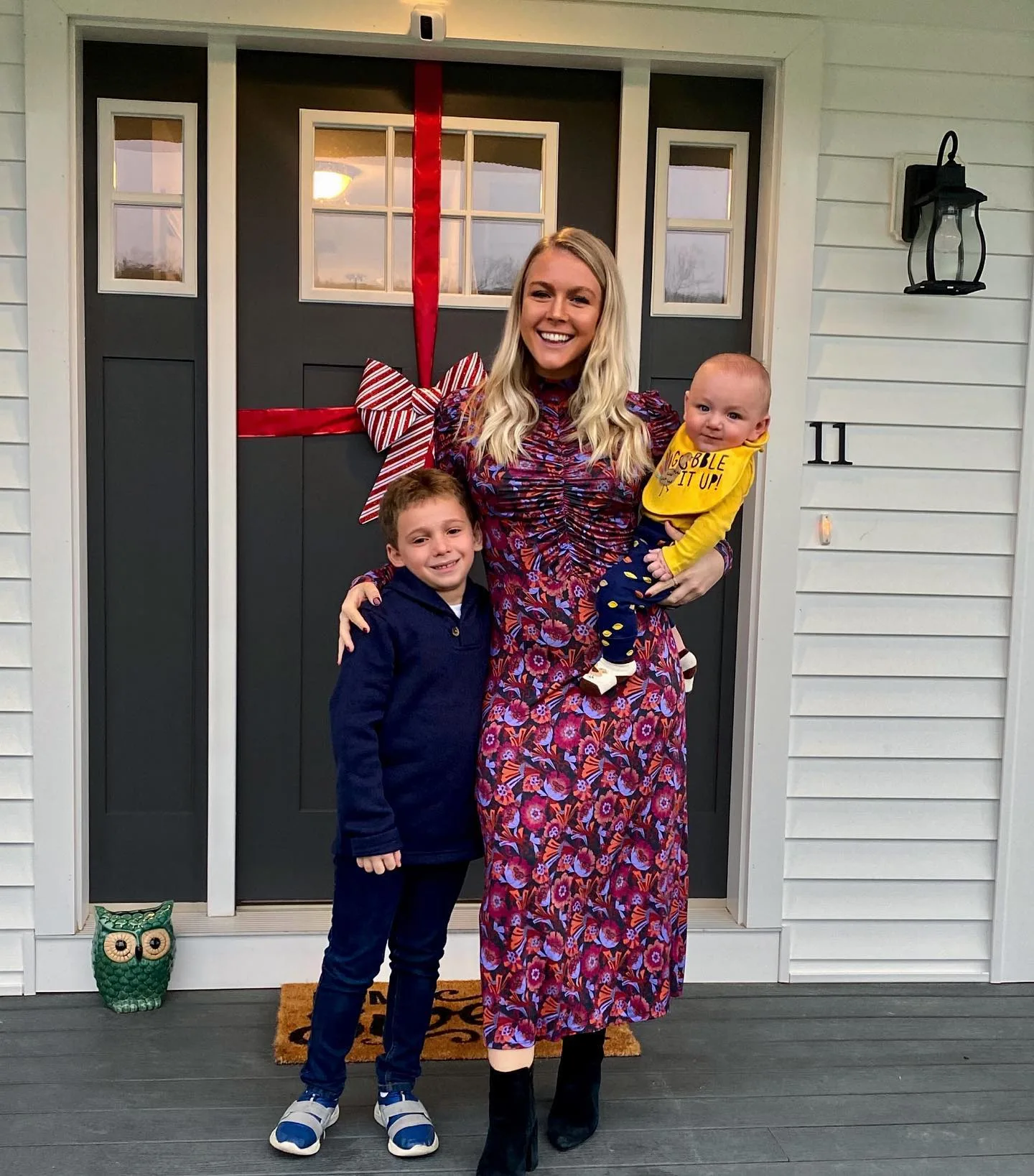 The Hampton property's covered porch is visible in this cheerful holiday photo, where the front doors have been transformed into an oversized Christmas present. It is a very different setting from Washington, and one that could become more significant now that Leavitt is stepping away from her daily White House duties.