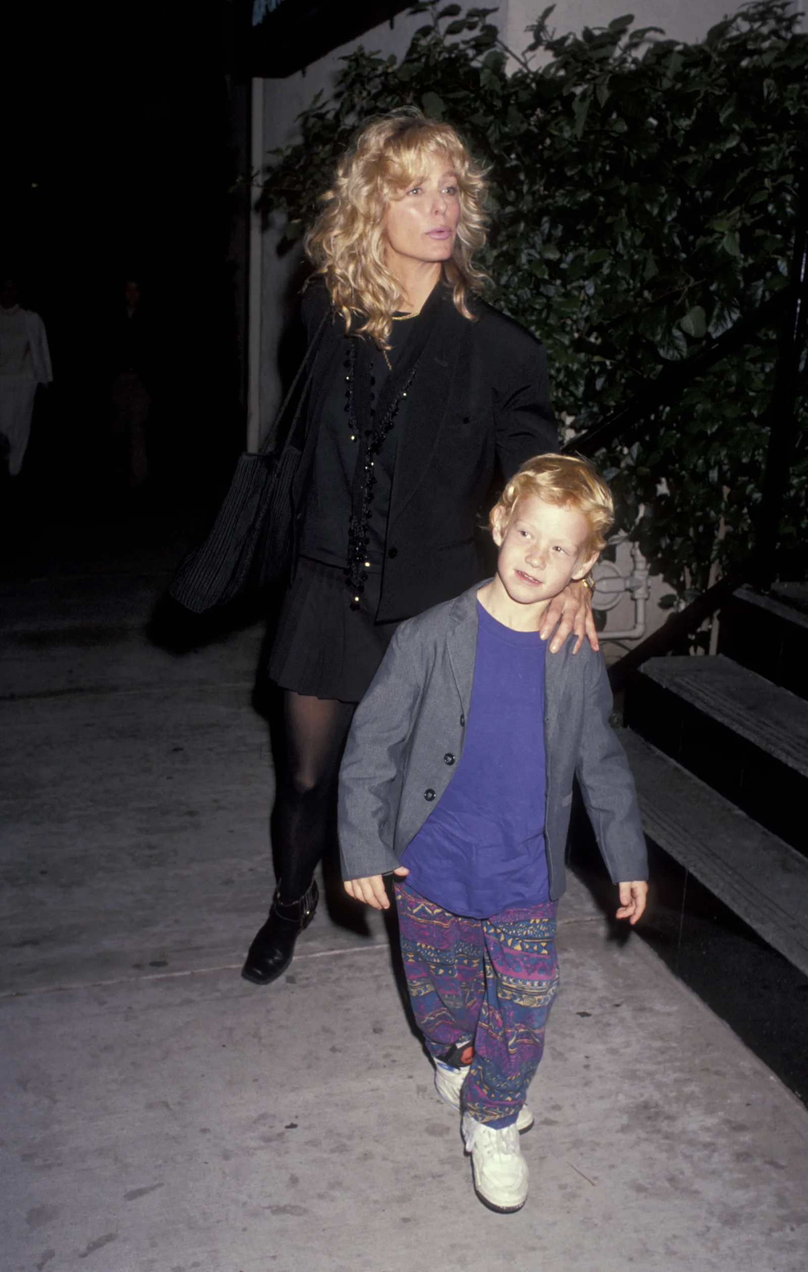 Farrah Fawcett and Redmond O'Neal are pictured at the "Watts Side Story" Performance on December 3, 1991