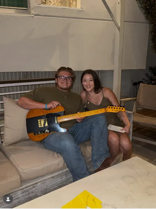 Zuma Rossdale happily posed with his girlfriend Theran Rose while showing off the new Fender Telecaster guitar she gifted him. He shared the special moment to celebrate his new instrument on August 23, 2026.