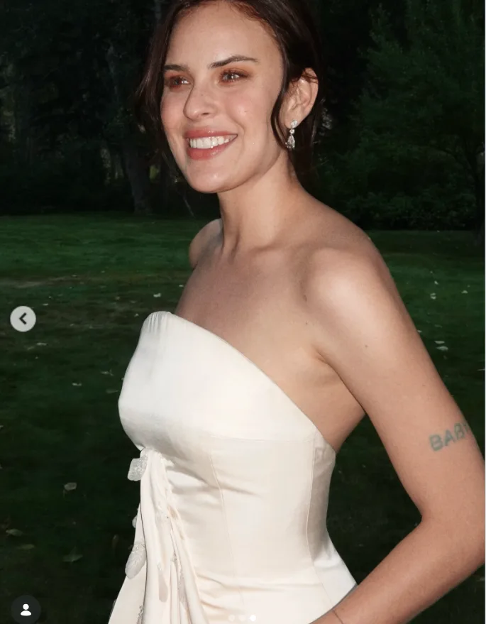 Tallulah Willis offers a glimpse of her custom wedding gown, giving fans a first look at the strapless ivory design ahead of its full reveal.