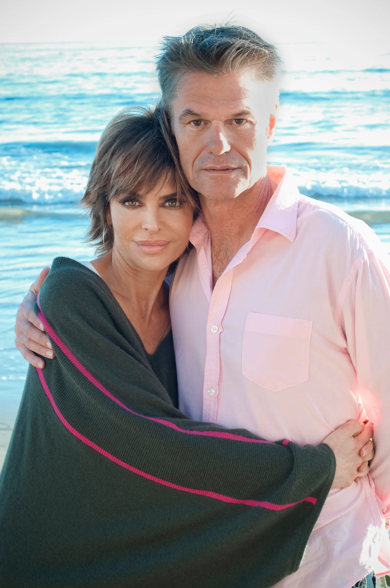 Lisa Rinna and Harry Hamlin posing on the beach in Malibu, California on January 7, 2013.