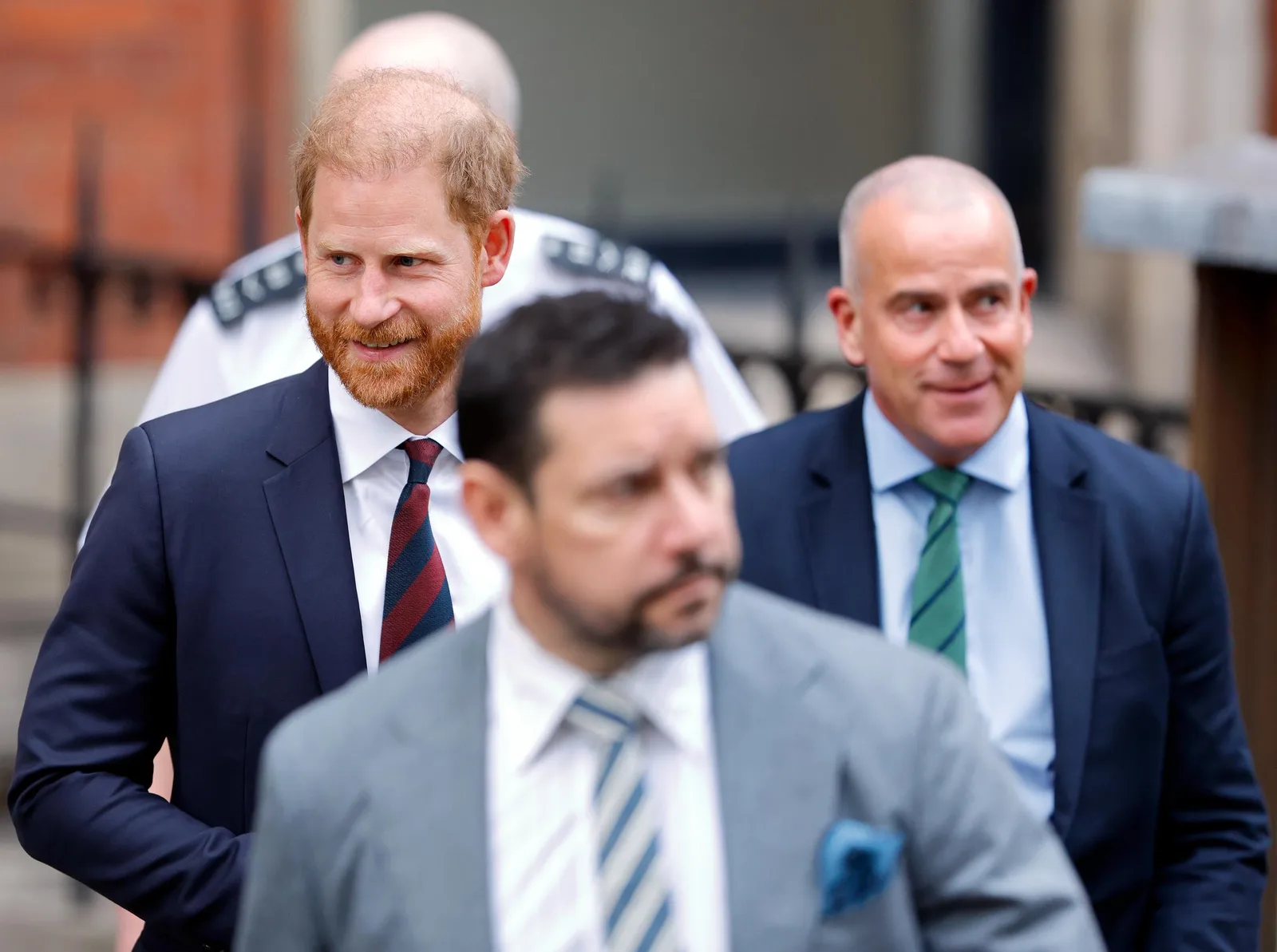 Prince Harry leaves the Royal Courts of Justice in London in January 2026. His return to Britain has put renewed attention on his relationship with the Royal Family after years of public disputes.