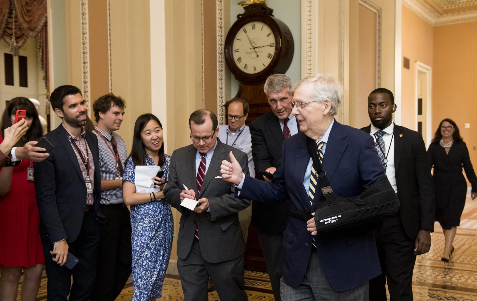 McConnell returned to the Senate wearing a sling after undergoing surgery to repair a fractured shoulder caused by a fall at his Kentucky home. The injury marked one of several health setbacks that would later draw renewed public attention.