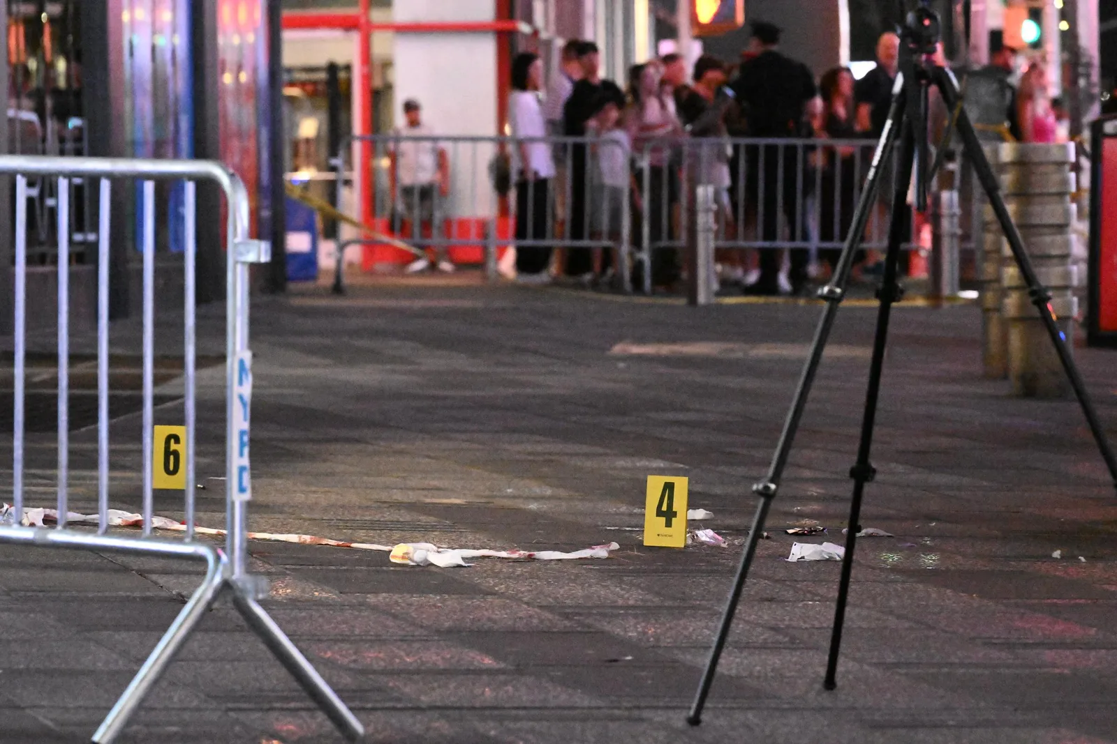 Investigators examined the Times Square scene after the stabbings and subsequent police shooting on August 31. The 68-year-old victim survived and was released from Bellevue Hospital late Tuesday afternoon, while Erin Piacenti died from her injuries.
